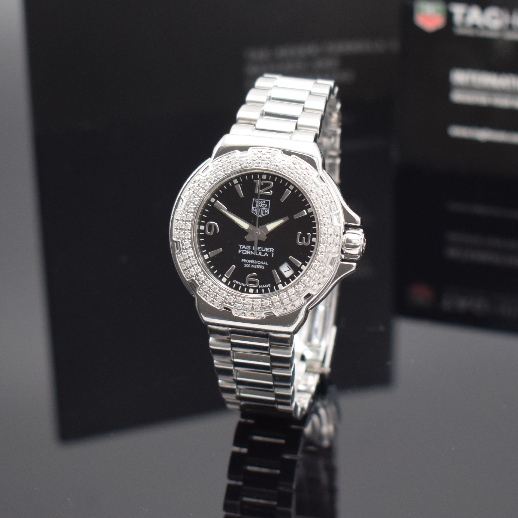 Detail c: TAG HEUER Formula 1 Damenarmbanduhr mit Brillantlünette Referenz WAC1214-0, quarz, Edelstahlgeh. inkl. Gliederband m. Faltschl. & ...