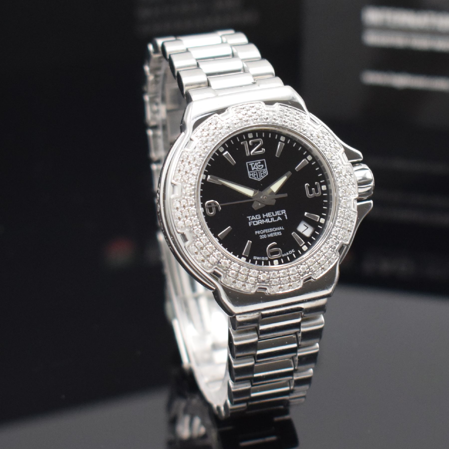 Detail f: TAG HEUER Formula 1 Damenarmbanduhr mit Brillantlünette Referenz WAC1214-0, quarz, Edelstahlgeh. inkl. Gliederband m. Faltschl. & ...