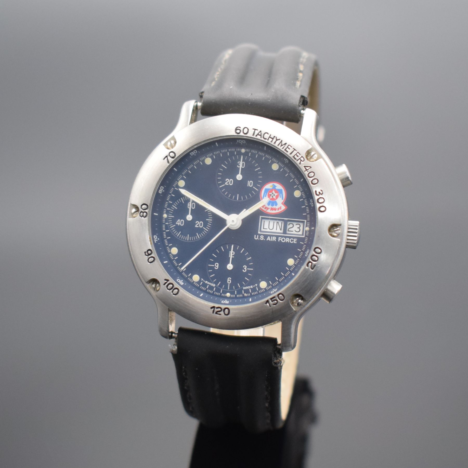 DPW U.S. Air Force Key West Herrenarmbanduhr mit Chronograph in Stahl, Schweiz um 1995, Automatik, Boden & Lünette verschr., dunkelblaues Zifferbl. ...