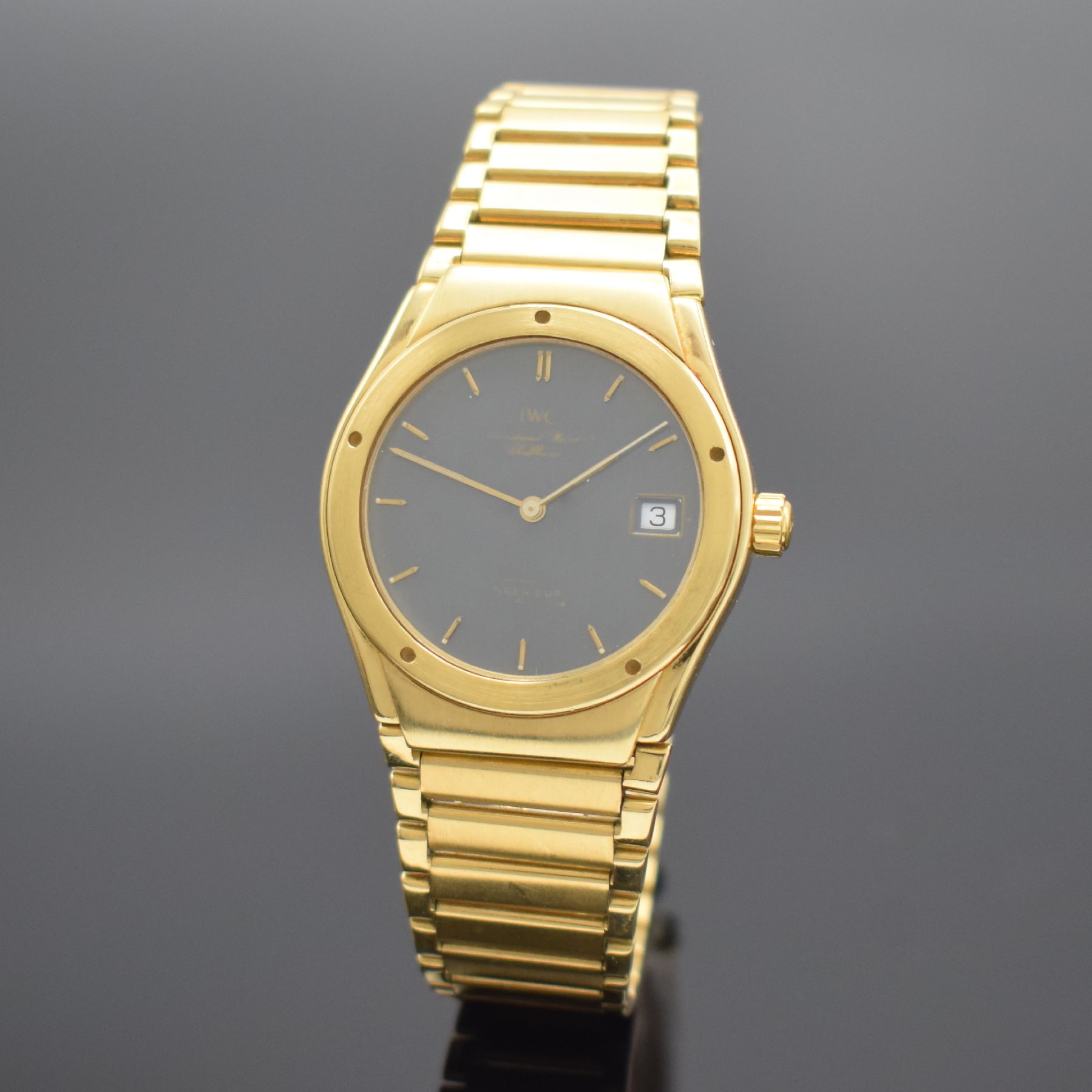 IWC Ingenieur Armbanduhr in GG 750/000 mit Goldband, Schweiz um 1985, quarz, massives Goldgeh., unsign. / nummerierter Boden geschr., orig. ...