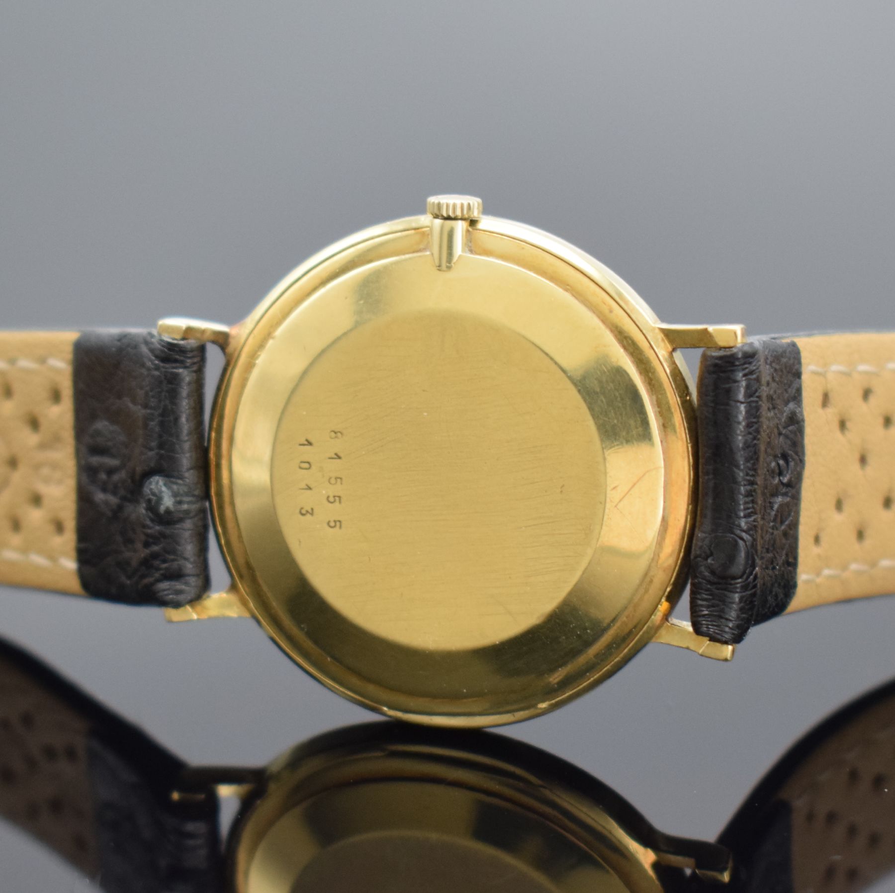 Detail c: CHOPARD Armbanduhr in GG 750/000 Referenz 1013, Schweiz um 1990, Handaufzug, Boden aufgedr., schwarzes Zifferbl. rest., gold. Std.-Ind & gold. ...