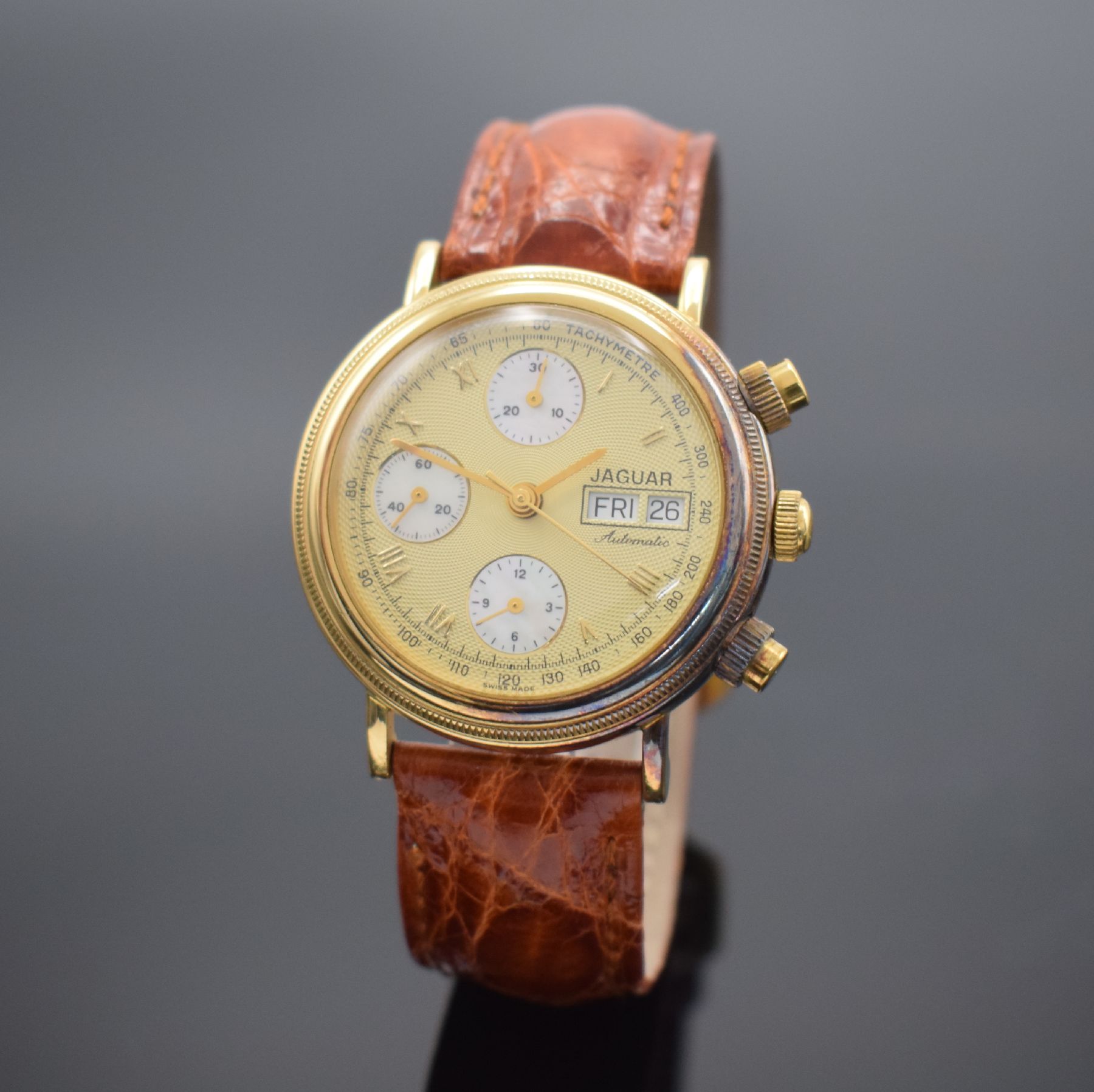 JAGUAR Herrenchronograph in GG 750/000, Schweiz um 2000, Automatik, 2-teil. Gehäuse, Boden aufgedr., verg. Zifferbl. m. röm. Zahlen, Hilfszifferbl. ...