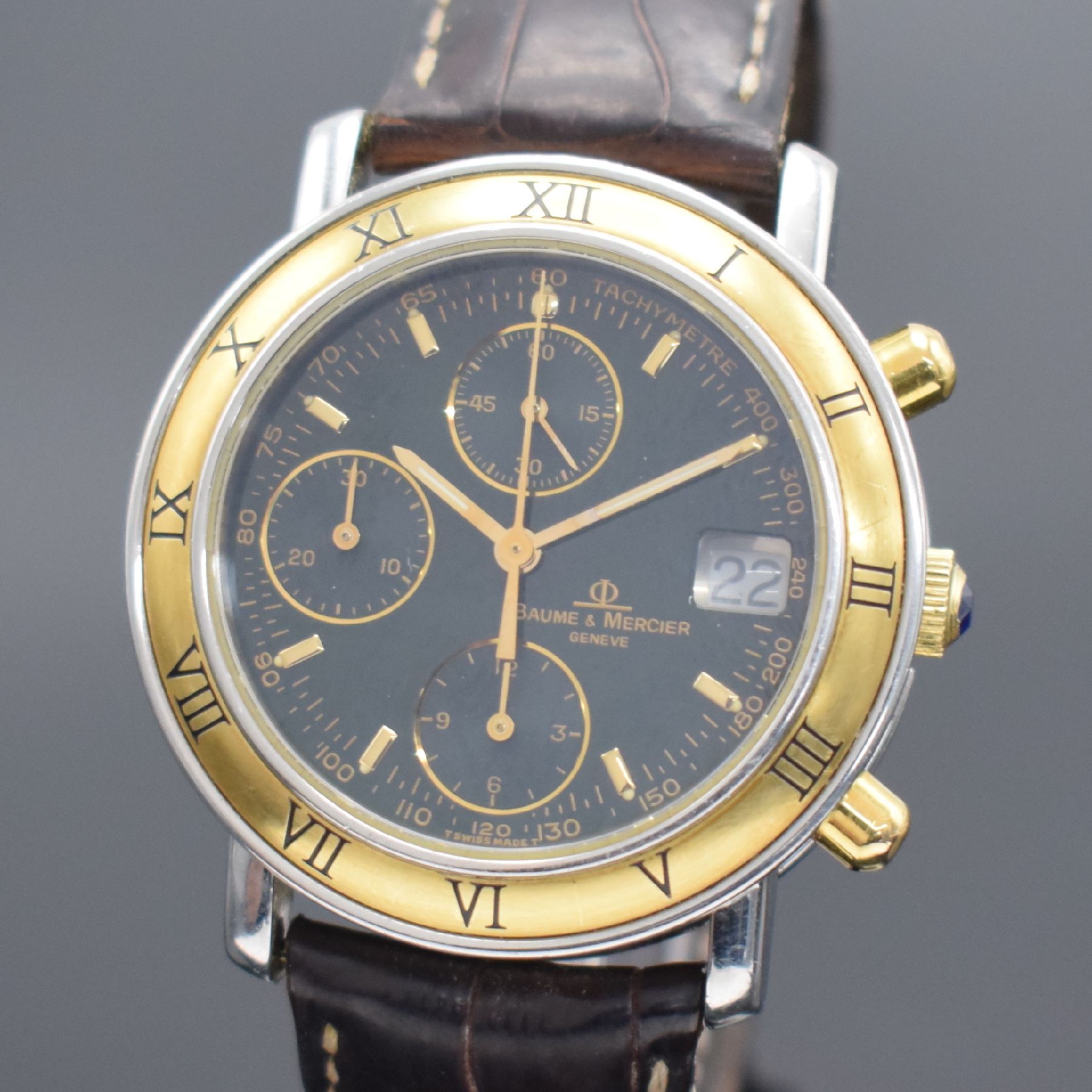 Detail a: BAUME & MERCIER Baumatic Herrenarmbanduhr mit Chronograph in Stahl/Gold, Schweiz um 1990, Automatik, Ref. 6104.018, Boden aufgedr., orig. Lederband ...