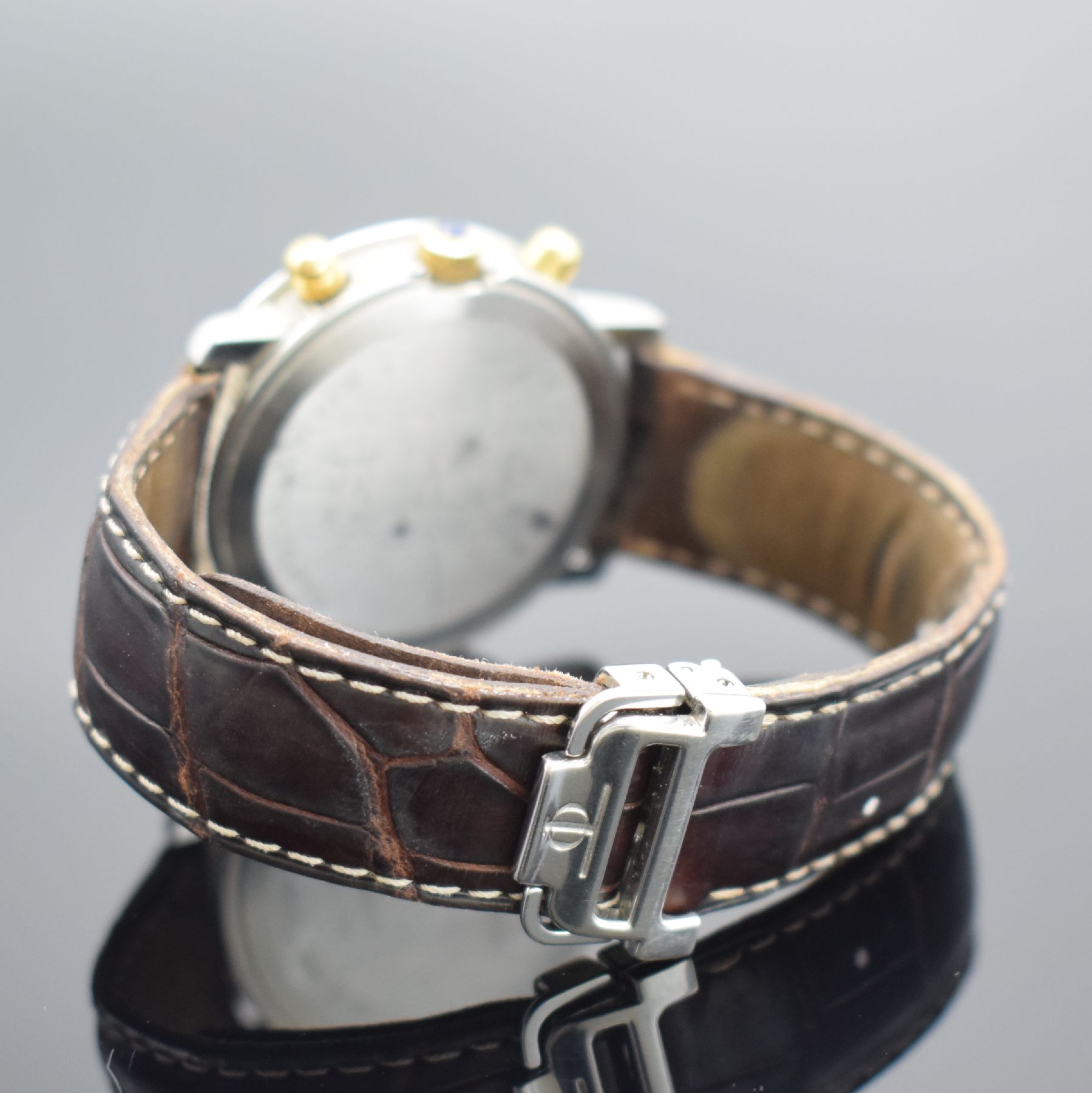 Detail c: BAUME & MERCIER Baumatic Herrenarmbanduhr mit Chronograph in Stahl/Gold, Schweiz um 1990, Automatik, Ref. 6104.018, Boden aufgedr., orig. Lederband ...
