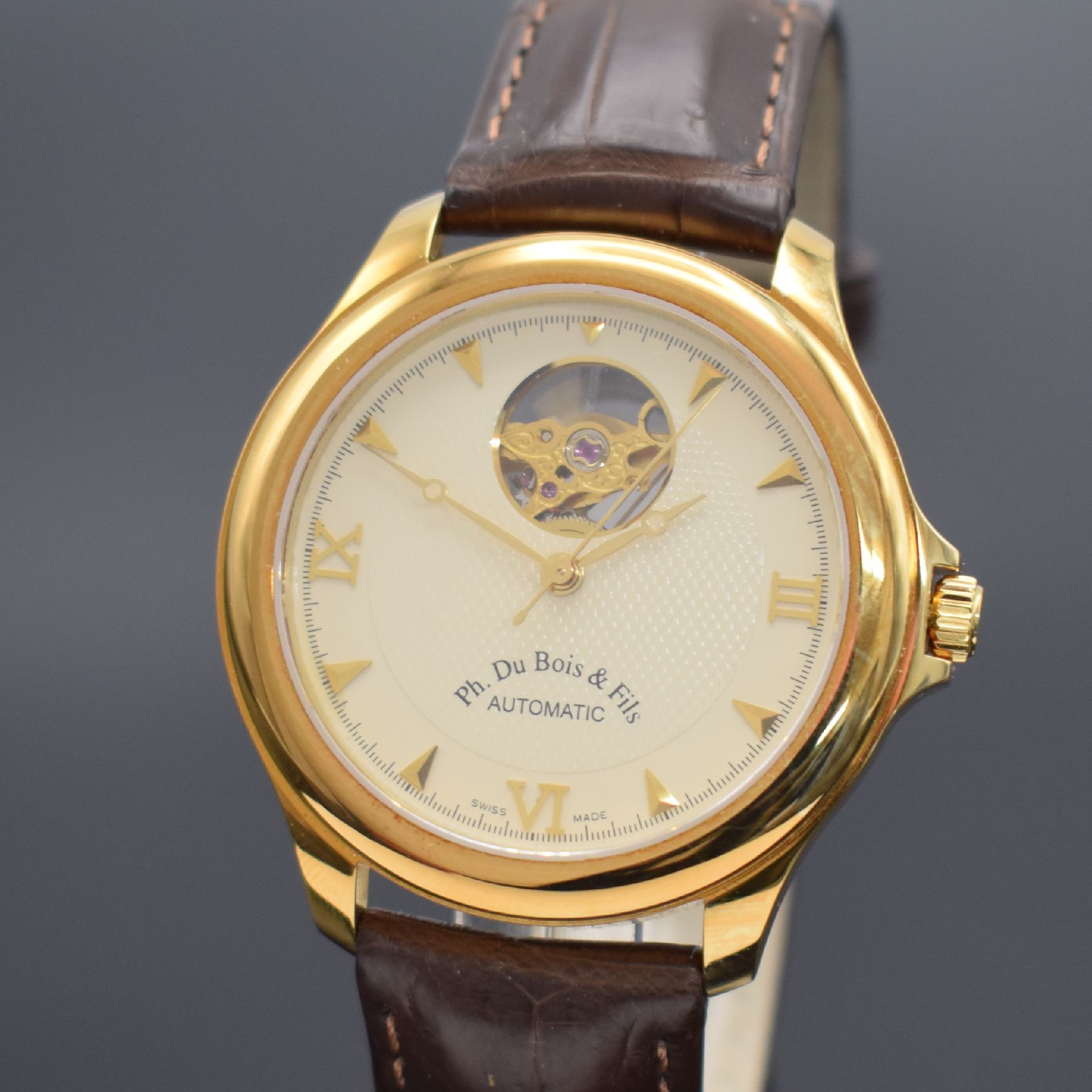 Detail a: PH. DU BOIS & FILS Herrenarmbanduhr in GG 750/000, Schweiz um 2005, Automatik, beids. vergl. Geh., Boden aufgedr., orig. Lederband m. orig. verg. ...