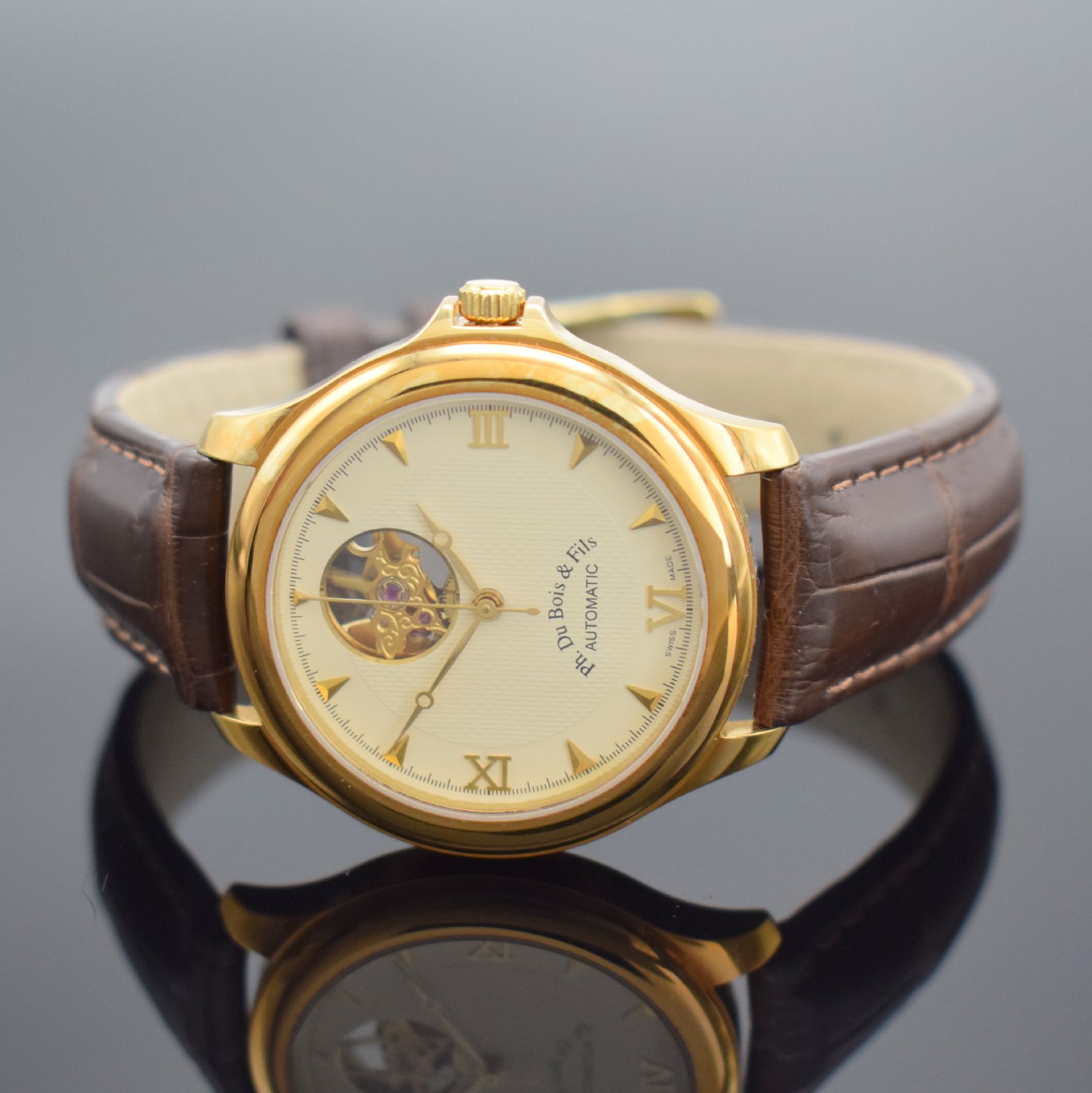 Detail b: PH. DU BOIS & FILS Herrenarmbanduhr in GG 750/000, Schweiz um 2005, Automatik, beids. vergl. Geh., Boden aufgedr., orig. Lederband m. orig. verg. ...