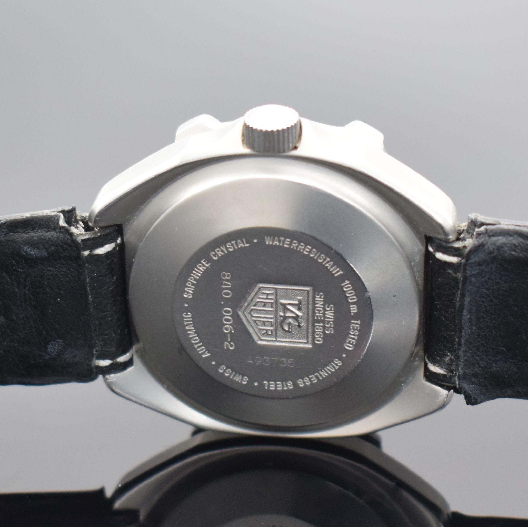 Detail e: TAG HEUER Super Professional Taucher- Herrenarmbanduhr, Schweiz um 1990, Automatik, Ref. 840.006-2, matt. Edelstahlgeh., Monocoque-Geh., Krone ...