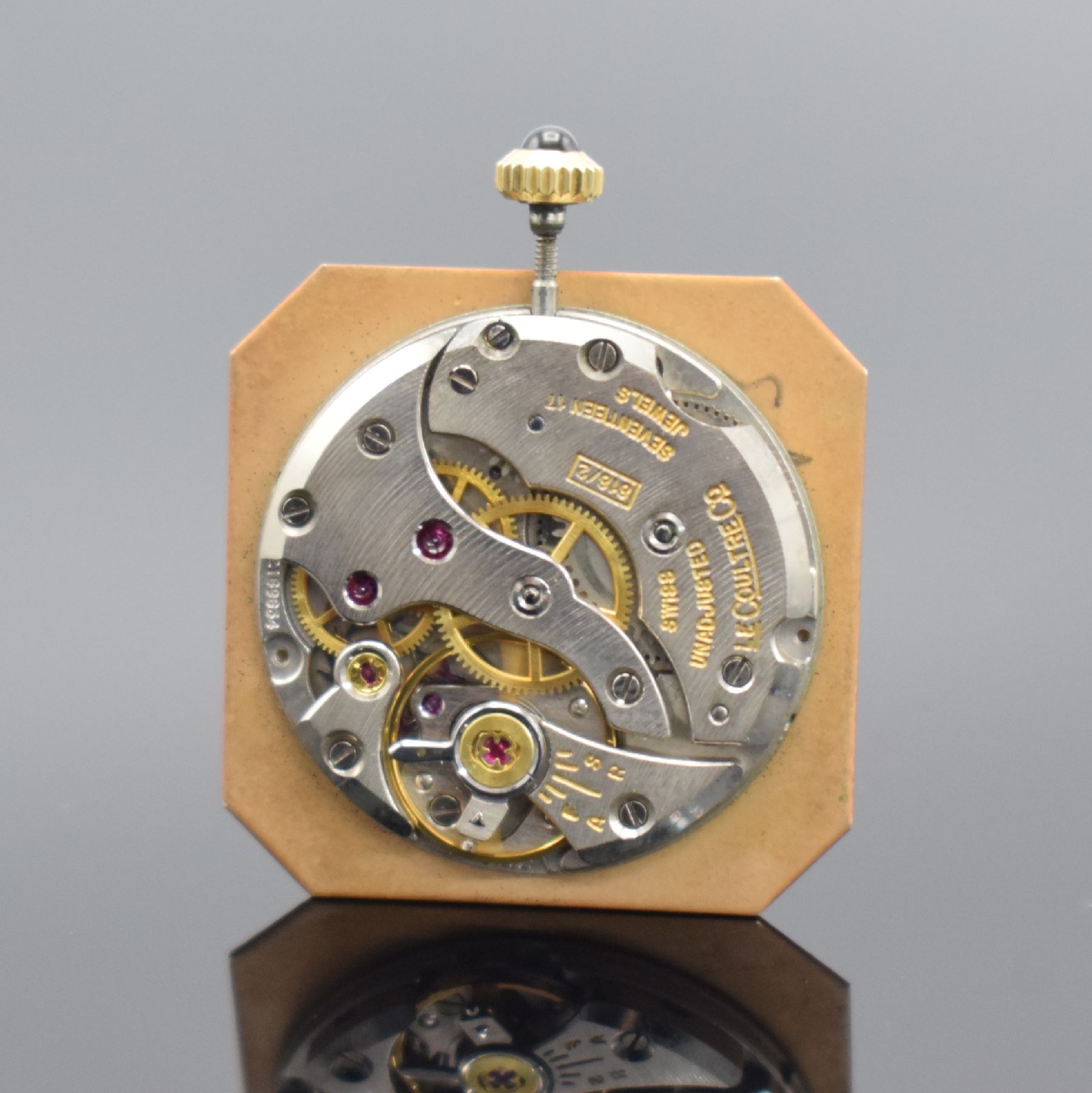 Detail e: Jaeger-LeCoultre Armbanduhr in GG 750/000, Schweiz um 1980, Handaufzug, Ref. 9112.21, 2- teil. Geh., Boden aufgedr., orig. Lederband (nicht vollst.) ...