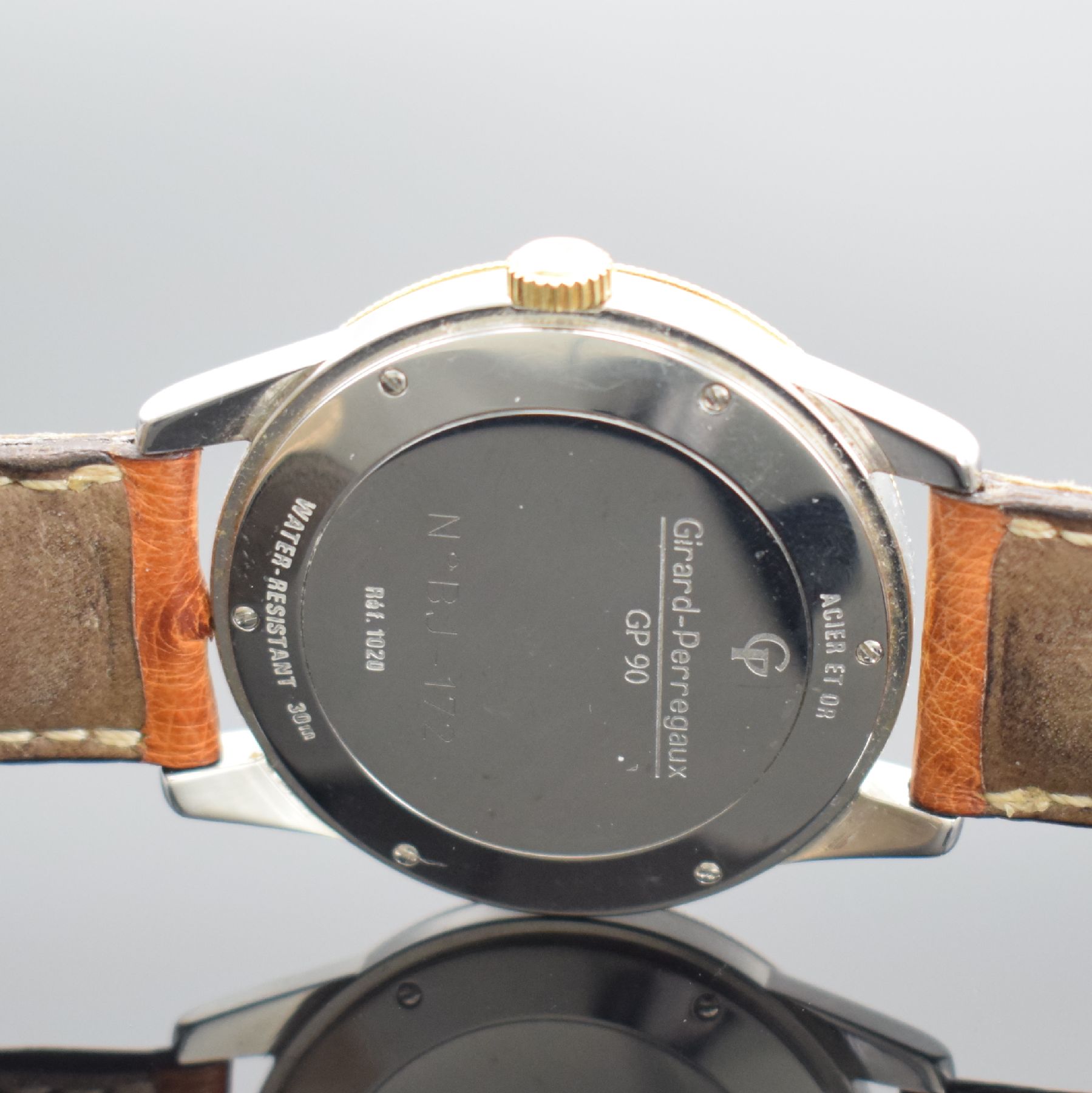 Detail e: GIRARD PERREGAUX GP 90 Herrenarmbanduhr in Stahl/Gold Referenz 1020, Schweiz um 2000, Automatik, Boden 6-fach verschr., orig. Lederband m. orig. ...