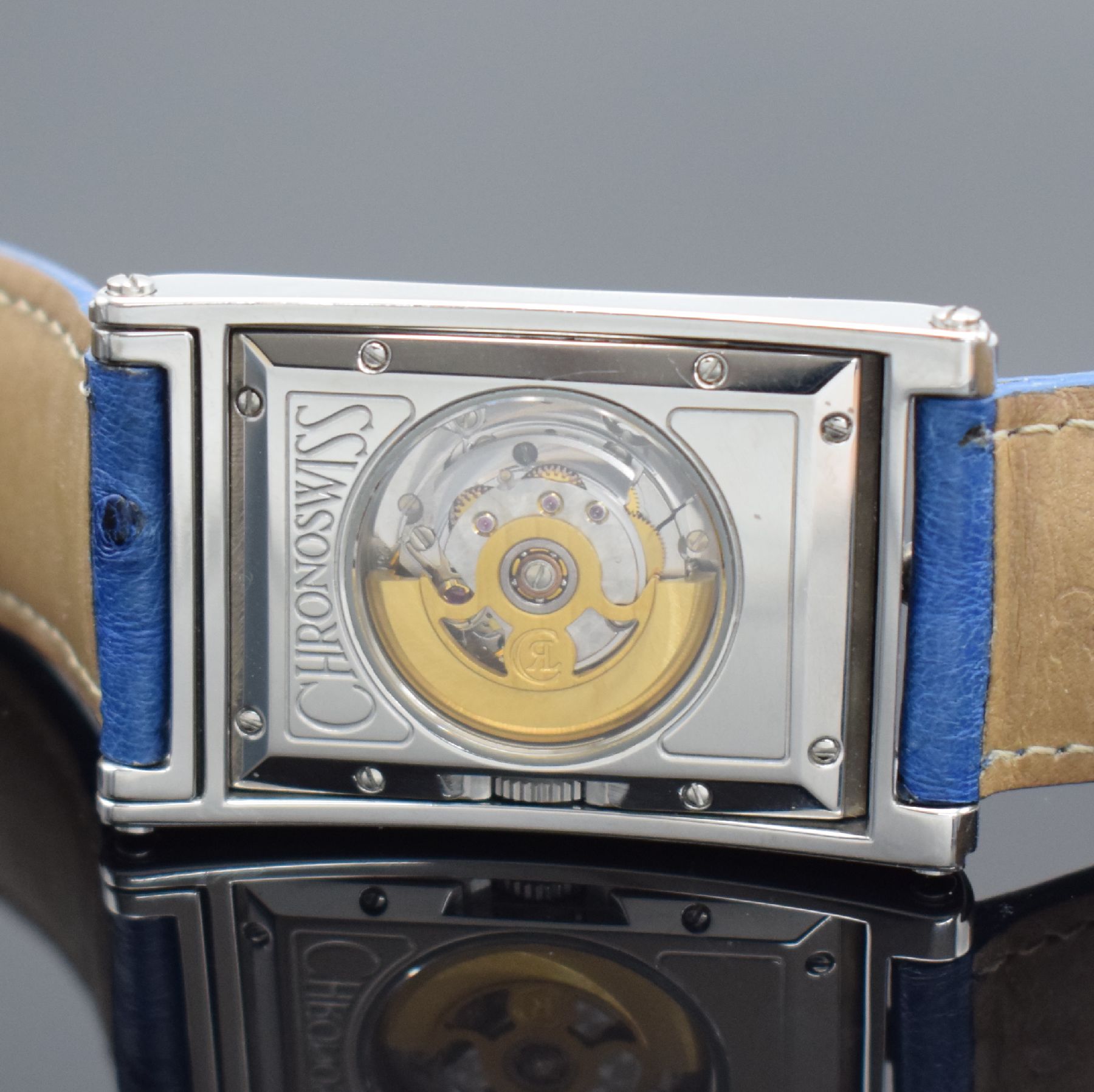 Detail e: CHRONOSWISS Cabrio Herrenarmbanduhr, Schweiz um 1995, Automatik, ausklappbares Edelst.-Wendegeh. inkl. orig. Lederband m. Dornschl., beids. vergl., ...