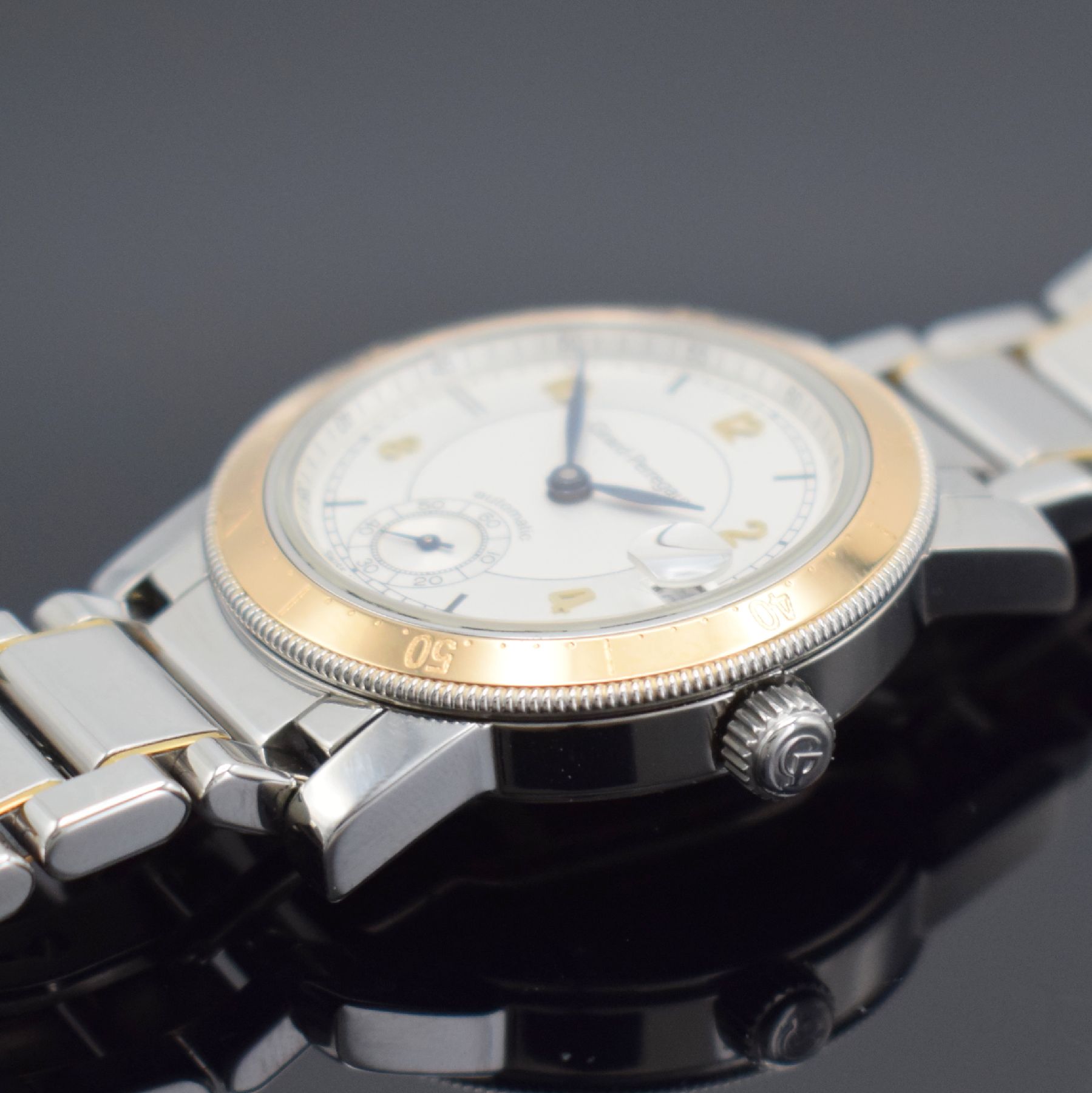 Detail d: GIRARD PERREGAUX Herrenarmbanduhr, Schweiz um 1995, Automatik, Edelstahl/Gold komb., Boden 6-fach verschr. (3x Schr. def. / nicht zu lösen), ...