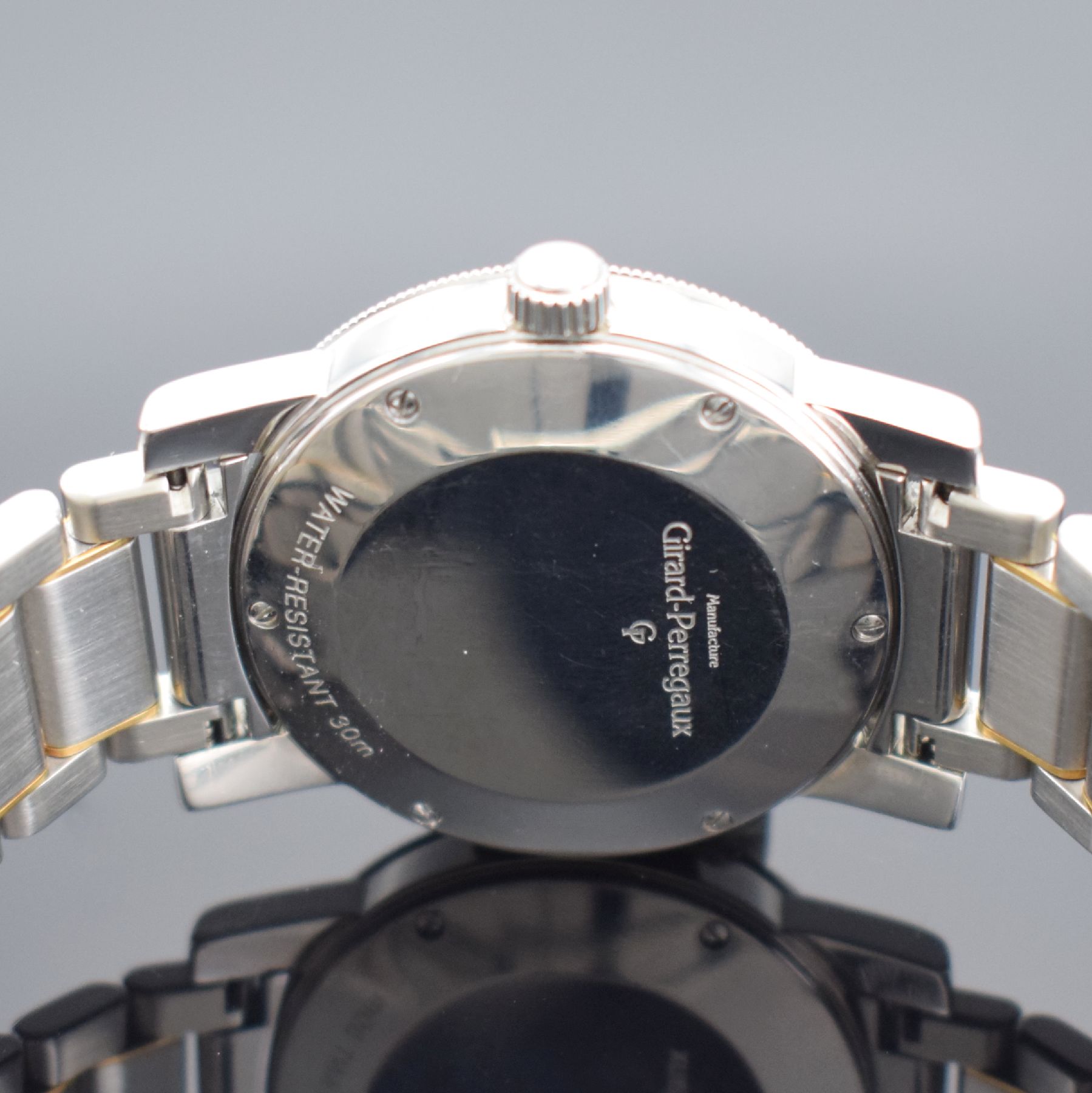 Detail e: GIRARD PERREGAUX Herrenarmbanduhr, Schweiz um 1995, Automatik, Edelstahl/Gold komb., Boden 6-fach verschr. (3x Schr. def. / nicht zu lösen), ...