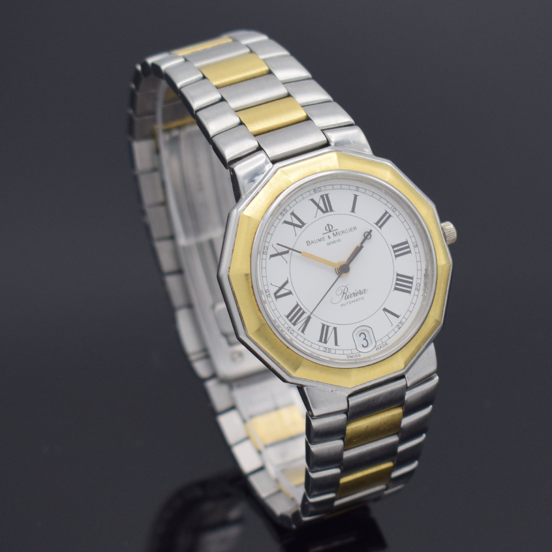 Detail e: BAUME & MERCIER Riviera Herrenarmbanduhr, Schweiz um 1995, Automatik, Ref. 3131, Edelstahl/Gold komb. inkl. orig. Gliederband m. Faltschl., Boden & ...