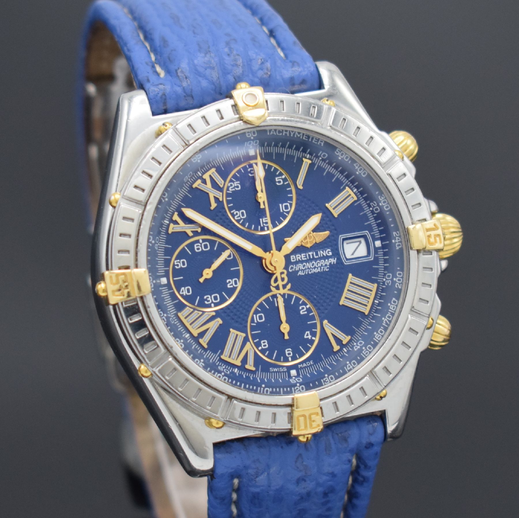 Detail e: BREITLING Armbandchronograph Crosswind Referenz B13055, Automatik, Schweiz um 1998, Edelstahl/Gold kombiniert inkl. Lederband m. orig. Faltschl., ...