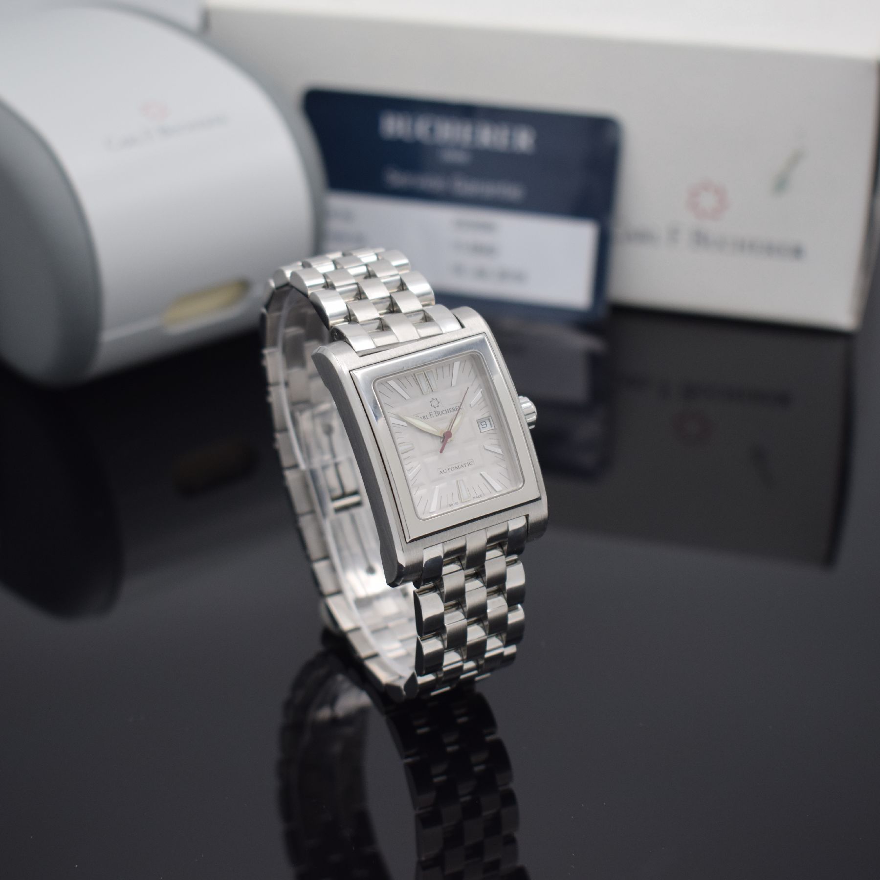Detail e: CARL F. BUCHERER Antecedo Herrenarmbanduhr, Schweiz verk. lt. Garantie 06/2002, Automatik, Edelstahlgeh. inkl. Gliederband m. dopp. Faltschl., Boden ...