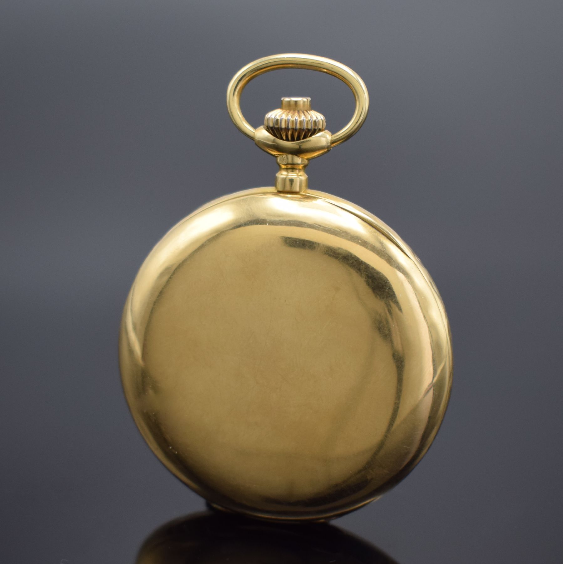 Detail a: Offene Taschenuhr mit Schaltradchronograph in GG 750/000, Schweiz um 1915, glattes Geh. dell., GG 750/000 Cuvette, Emailzifferbl. m. arab. Zahlen, ...