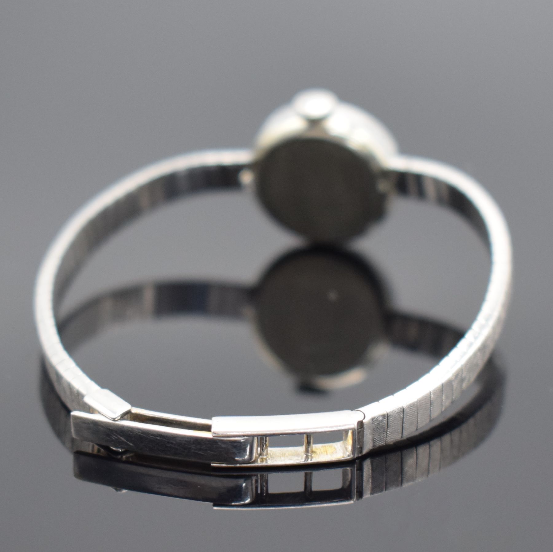 Detail b: ESZEHA Damenarmbanduhr in WG 750/000 & 585/000, Deutschland/Schweiz um 1940, Handaufzug, 2-teil. Geh. in WG 585/000, Boden aufgedr., Lünette m. ...
