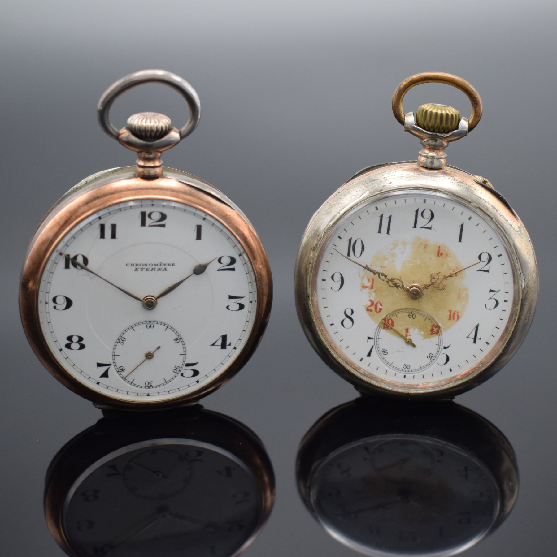 IWC / ETERNA 2 offene Herrentaschenuhren in Silber, Schweiz um 1895/1920, guill. Geh. m. verg. Rändern dell./berieben, Emailzifferblätter riss., ...