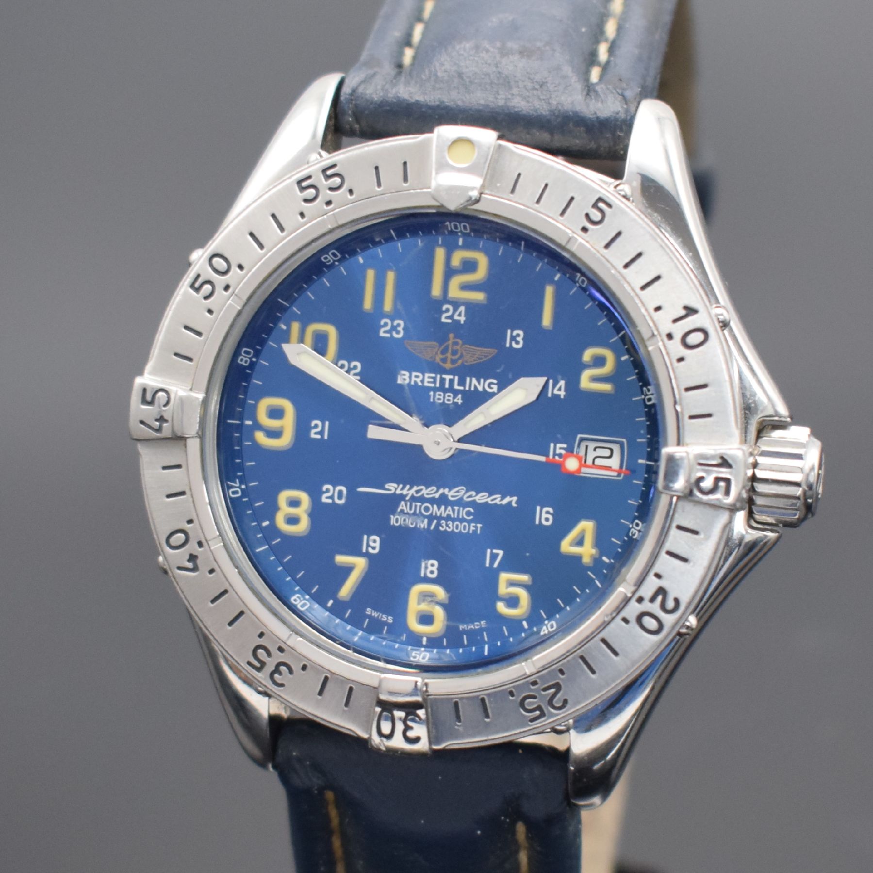 Detail a: BREITLING Superocean Herrenarmbanduhr in Edelstahl, Schweiz um 1995, Automatik, Ref. A17040, eins. drehbare Lunette m. 60er-Tlg., Glas verkr., ...