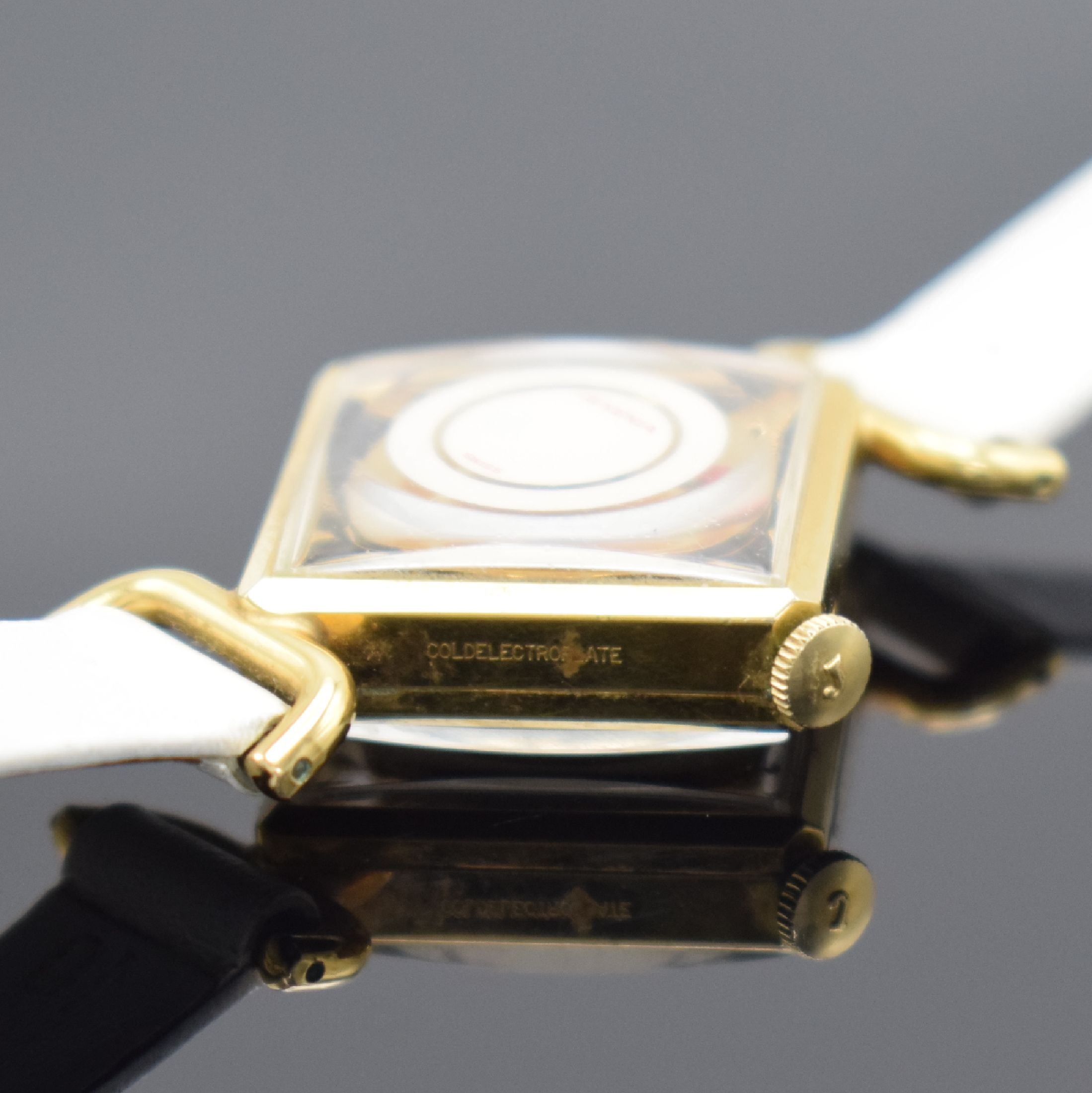 Detail b: JUVENIA vergoldete Cocktail Watch, Schweiz 1960er Jahre, Handaufzug, quadratisches Geh., Boden aufgedr., weißes Zifferbl. m. roten Zeigern, Kal. ...