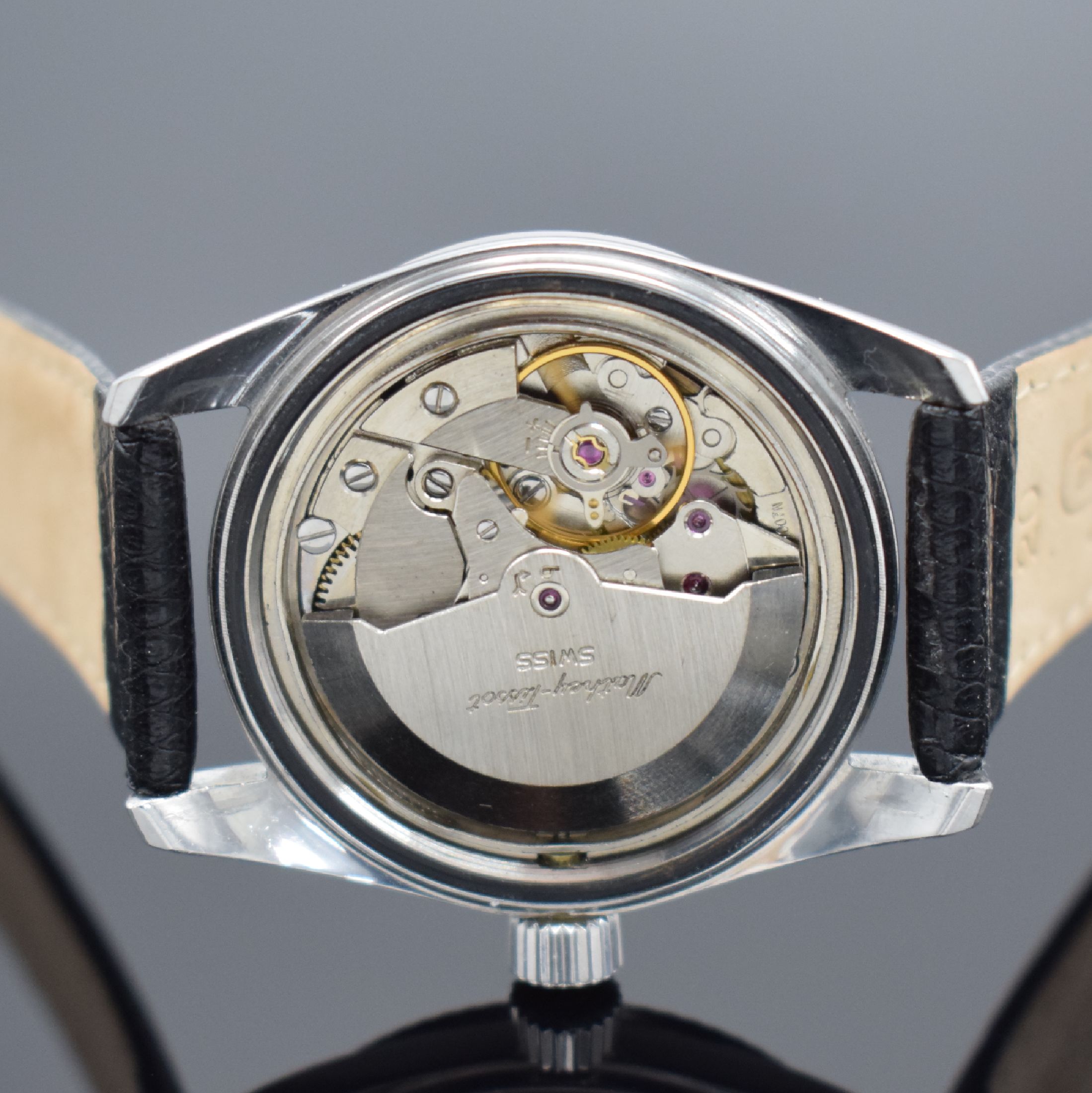 Detail f: MATHEY-TISSOT Datic Herrenarmbanduhr in Stahl, Schweiz um 1965, Automatik, Boden & Krone verschr., rhod. Riffel-Lünette, silb. Tritium-Zifferbl. m. ...