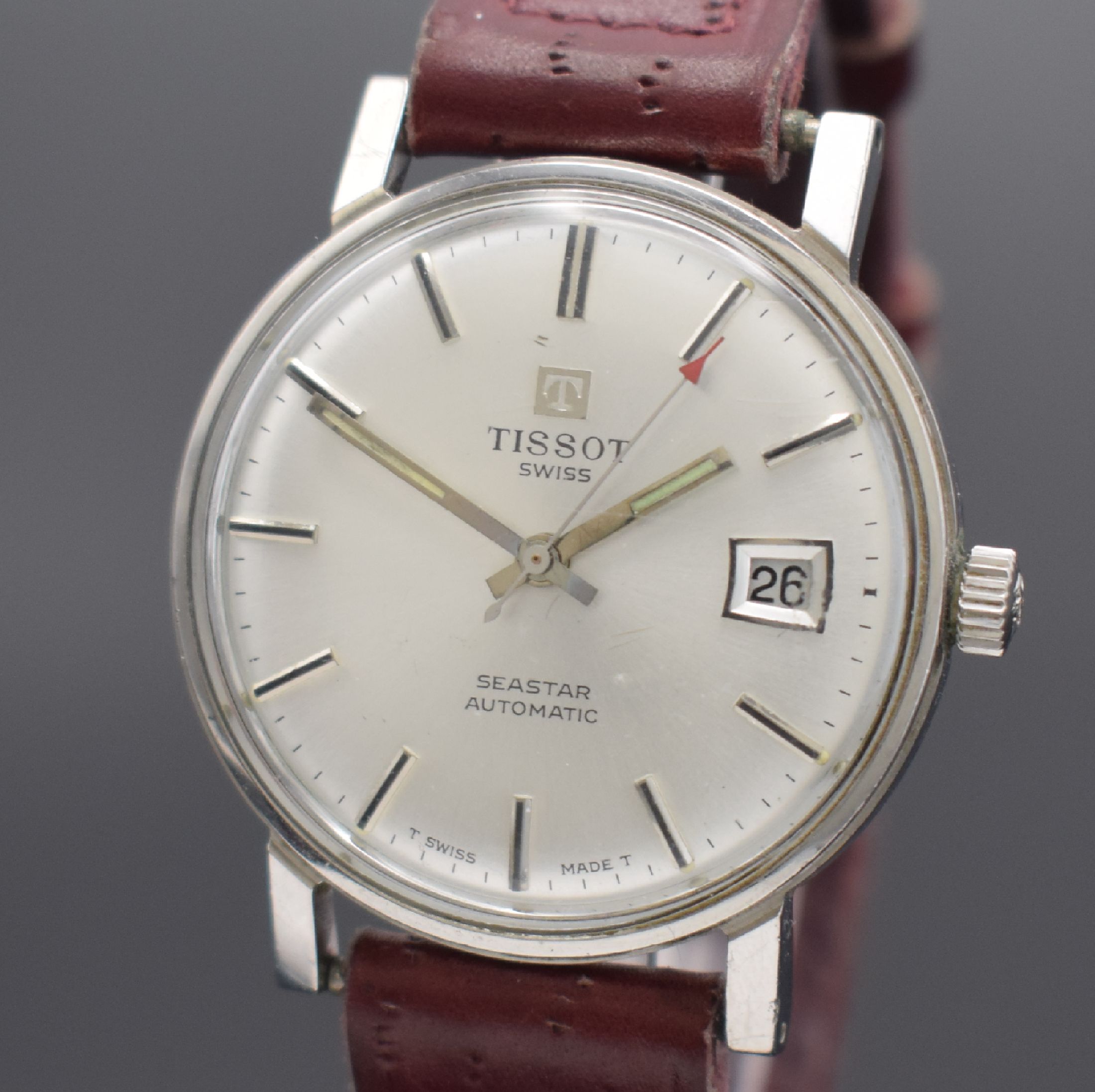 Detail a: TISSOT Seastar Herrenarmbanduhr in Stahl, Schweiz um 1970, Automatik, verschr. Boden, silb. Zifferbl. m. aufgel. Std.-Ind., silb. Leuchtzeiger, Datum ...