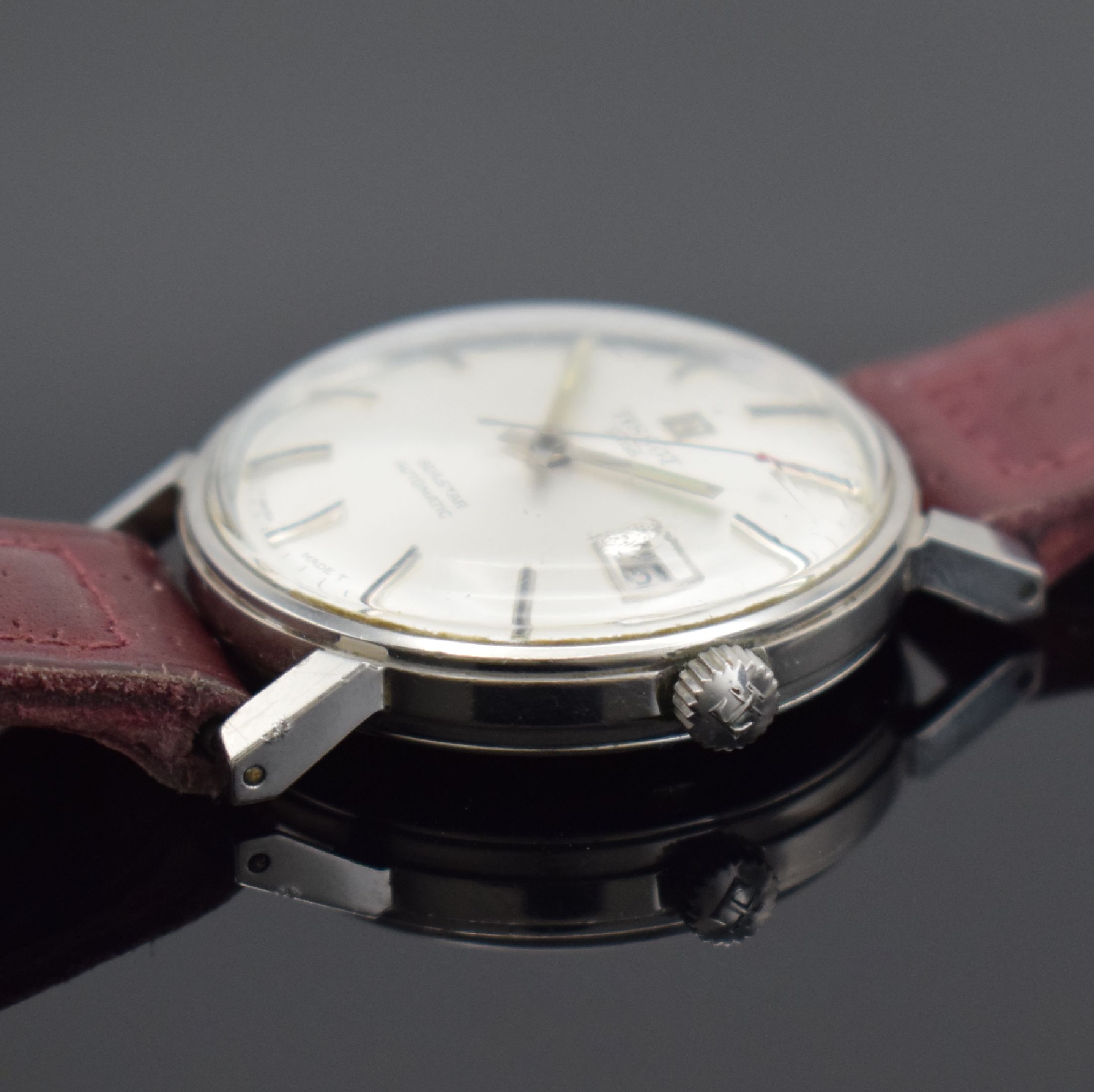 Detail b: TISSOT Seastar Herrenarmbanduhr in Stahl, Schweiz um 1970, Automatik, verschr. Boden, silb. Zifferbl. m. aufgel. Std.-Ind., silb. Leuchtzeiger, Datum ...