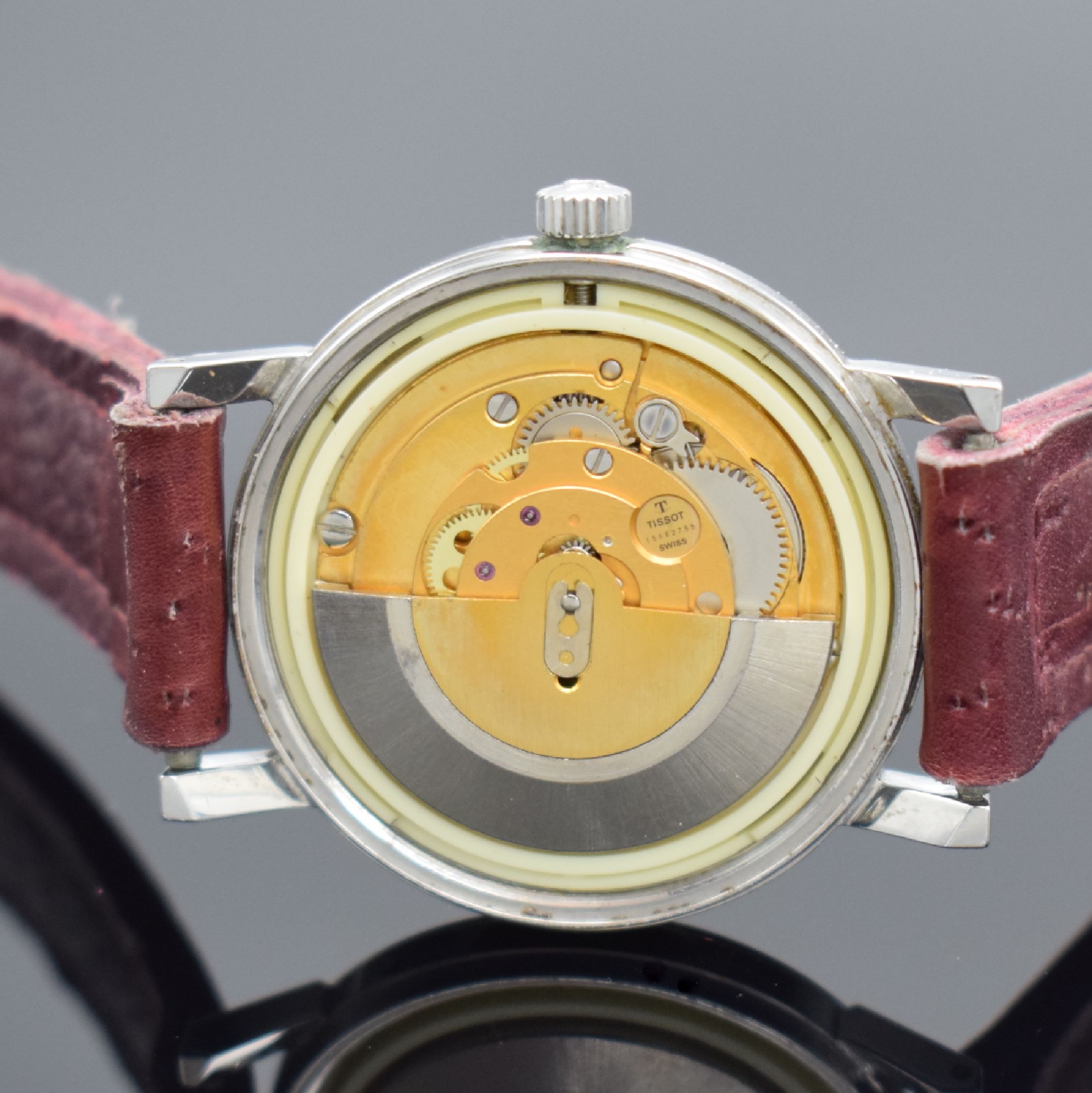 Detail d: TISSOT Seastar Herrenarmbanduhr in Stahl, Schweiz um 1970, Automatik, verschr. Boden, silb. Zifferbl. m. aufgel. Std.-Ind., silb. Leuchtzeiger, Datum ...
