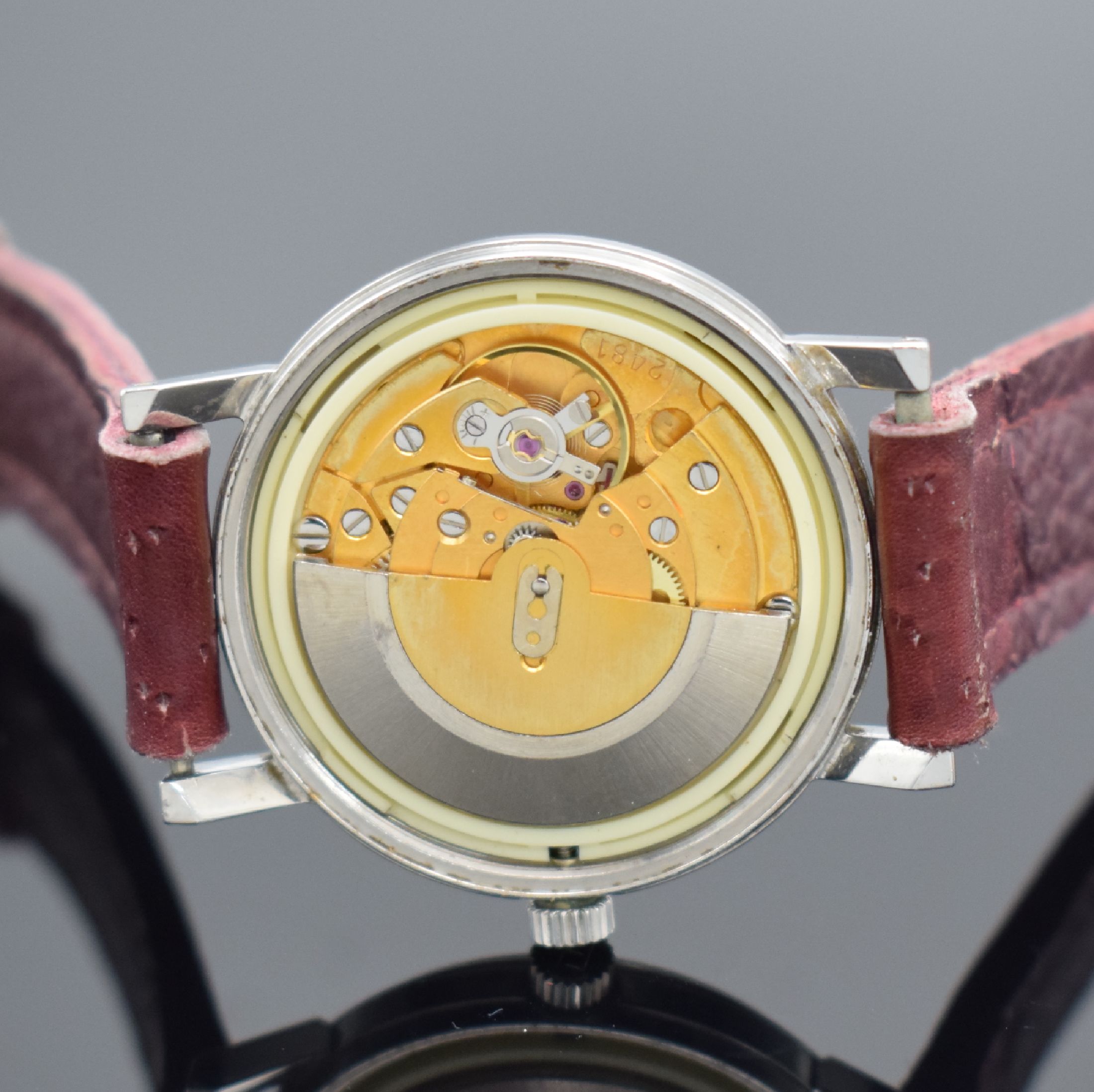 Detail e: TISSOT Seastar Herrenarmbanduhr in Stahl, Schweiz um 1970, Automatik, verschr. Boden, silb. Zifferbl. m. aufgel. Std.-Ind., silb. Leuchtzeiger, Datum ...