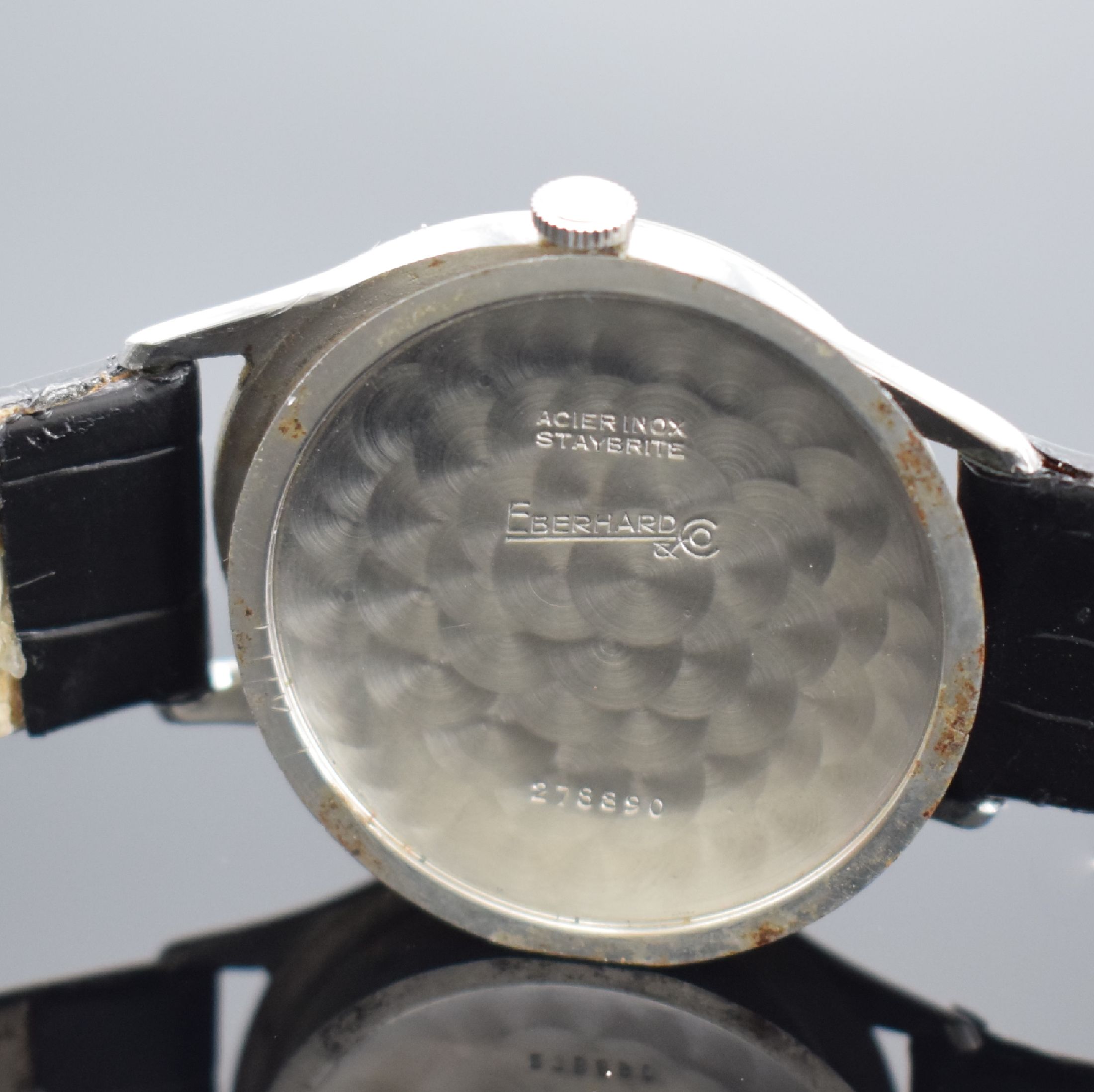 Detail e: EBERHARD & CO Herrenarmbanduhr in Stahl, Schweiz um 1940, Handaufzug, Boden aufgedr., silb. Zifferbl. pat., röm. Zahlen, gebl. Zeiger korrod., ...