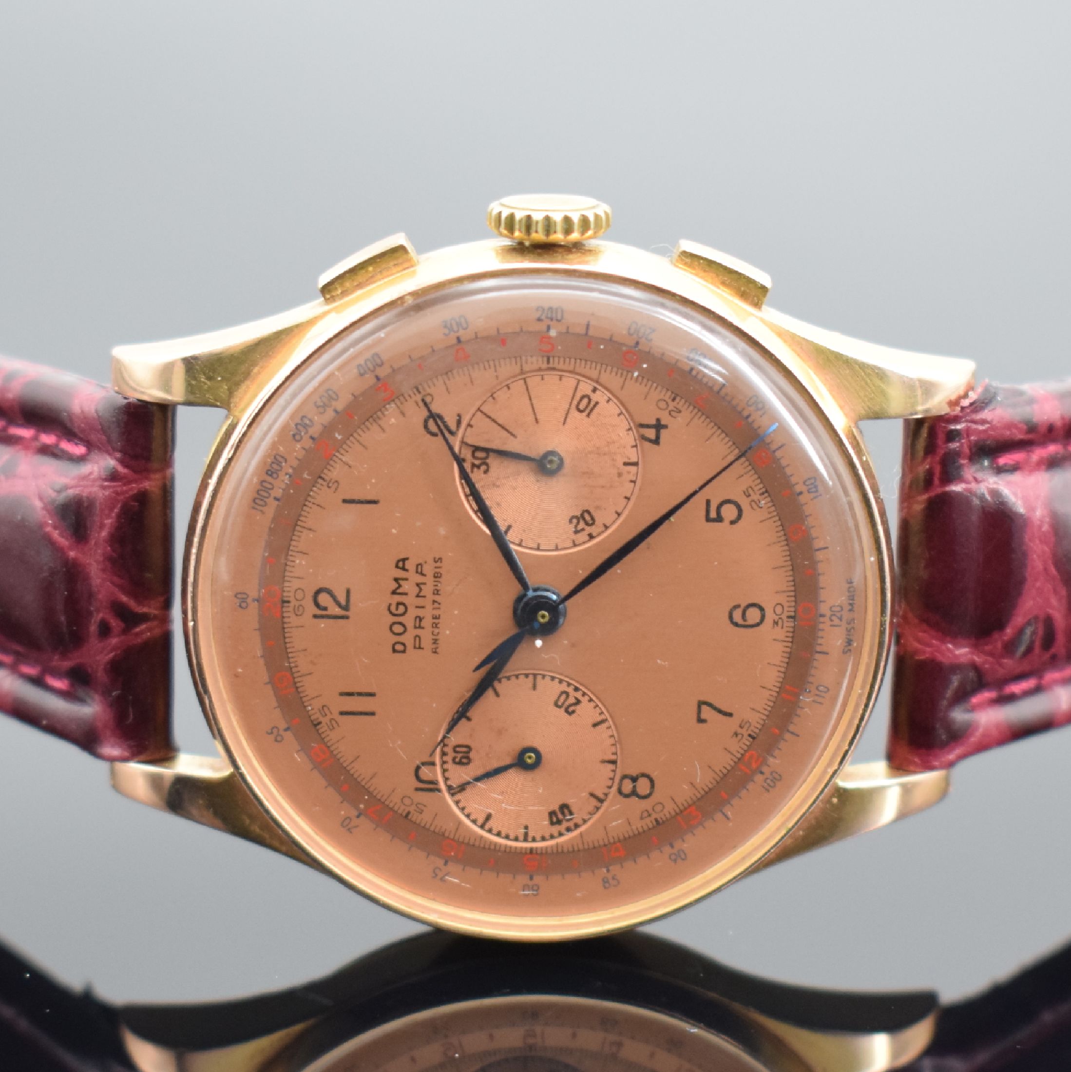Detail b: DOGMA Prima Herrenchronograph in RoséG 750/000, Schweiz um 1950, Handaufzug, Geh. dell., Boden & Glasrand aufgedr., kupferfarb. Zifferbl. m. arab. ...
