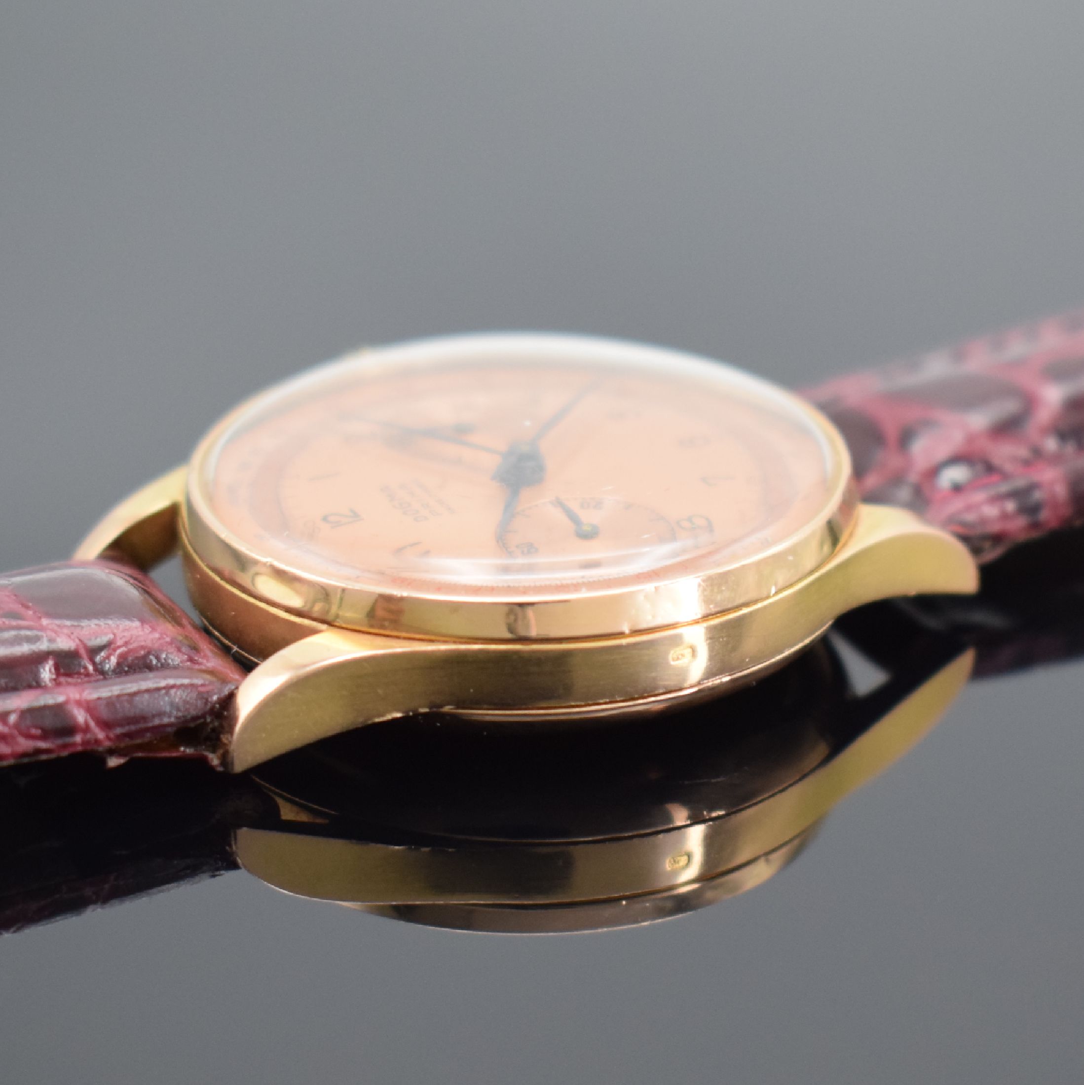 Detail c: DOGMA Prima Herrenchronograph in RoséG 750/000, Schweiz um 1950, Handaufzug, Geh. dell., Boden & Glasrand aufgedr., kupferfarb. Zifferbl. m. arab. ...