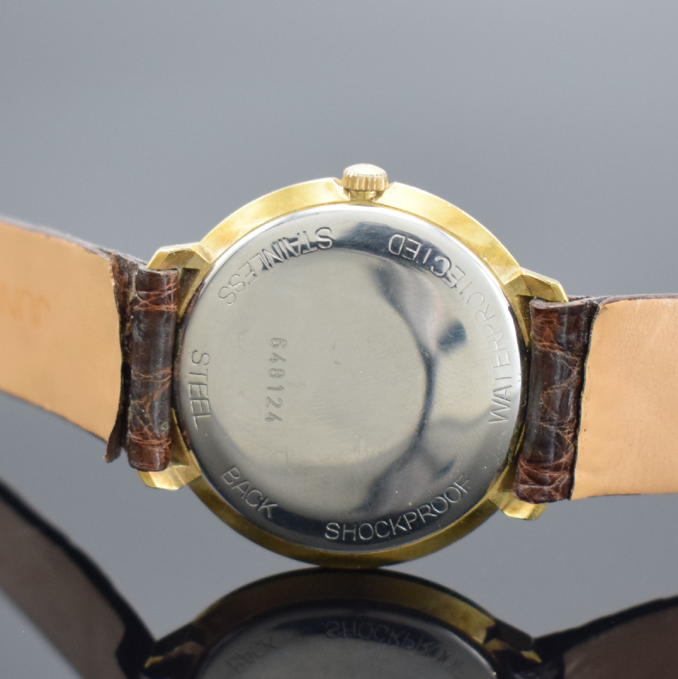 Detail d: JUNGHANS Chronometer vergoldete Herrenarmbanduhr Kaliber 685, Deutschland um 1965, Handaufzug, Stahlboden aufgedr., orig. Lederband m. verg. ...