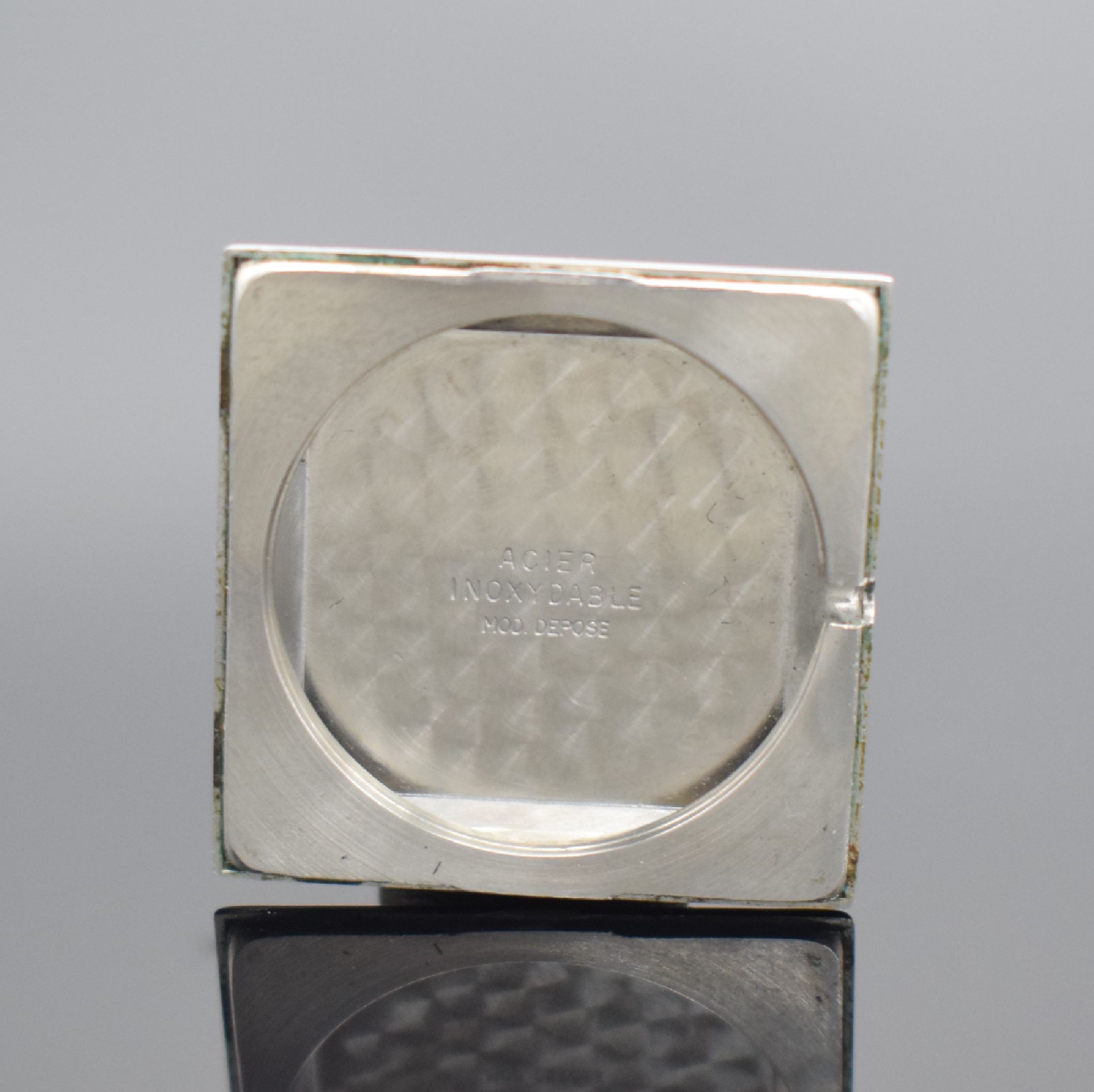 Detail e: EBEL President Armbanduhr in Stahl, Schweiz um 1965, Handaufzug, Boden aufgedr., silb. Zifferbl. m. aufgel. Ind., silb. Zeiger, Kal. 97, M. ca. 29 x ...