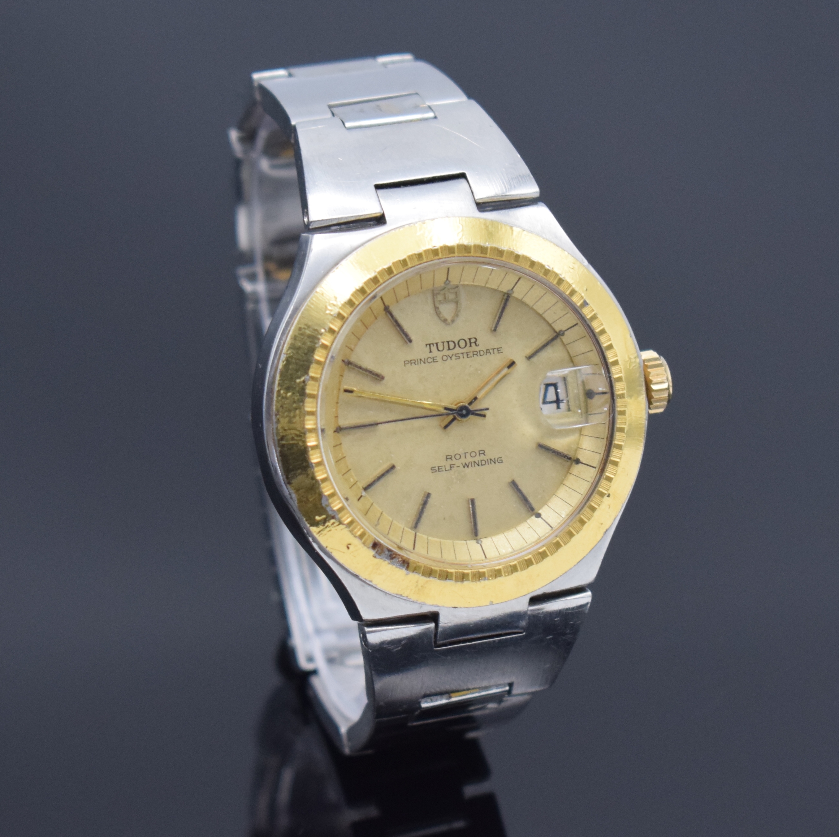 Detail b: TUDOR Prince Oysterdate Herrenarmbanduhr Referenz 9101/01, Schweiz um 1973, Automatik, Edelstahl Oystergeh. z. T. verg., integr. Band Ref. 9585, ...