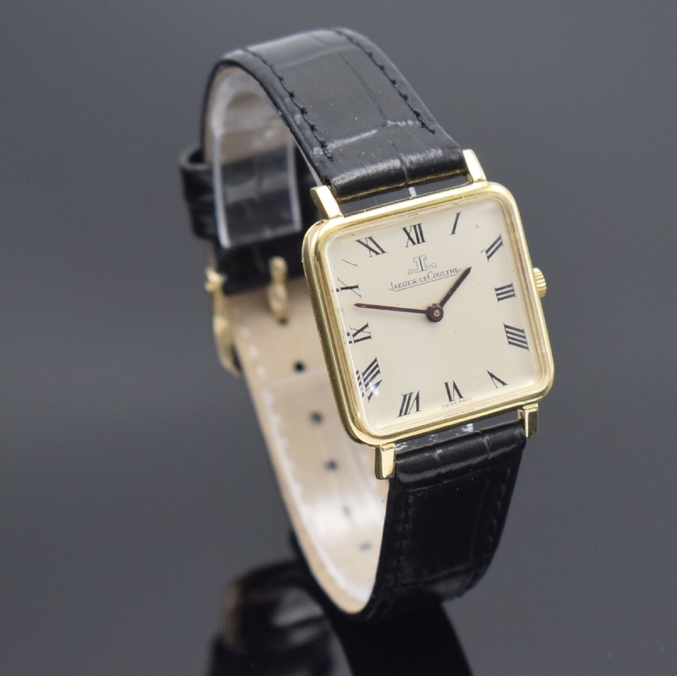 Detail b: Jaeger-LeCoultre quadratische Armbanduhr in GG 750/000, Schweiz um 1965, Handaufzug, gedr. Geh., silb. Zifferbl. m. röm. Zahlen dell., orig. Zeiger, ...