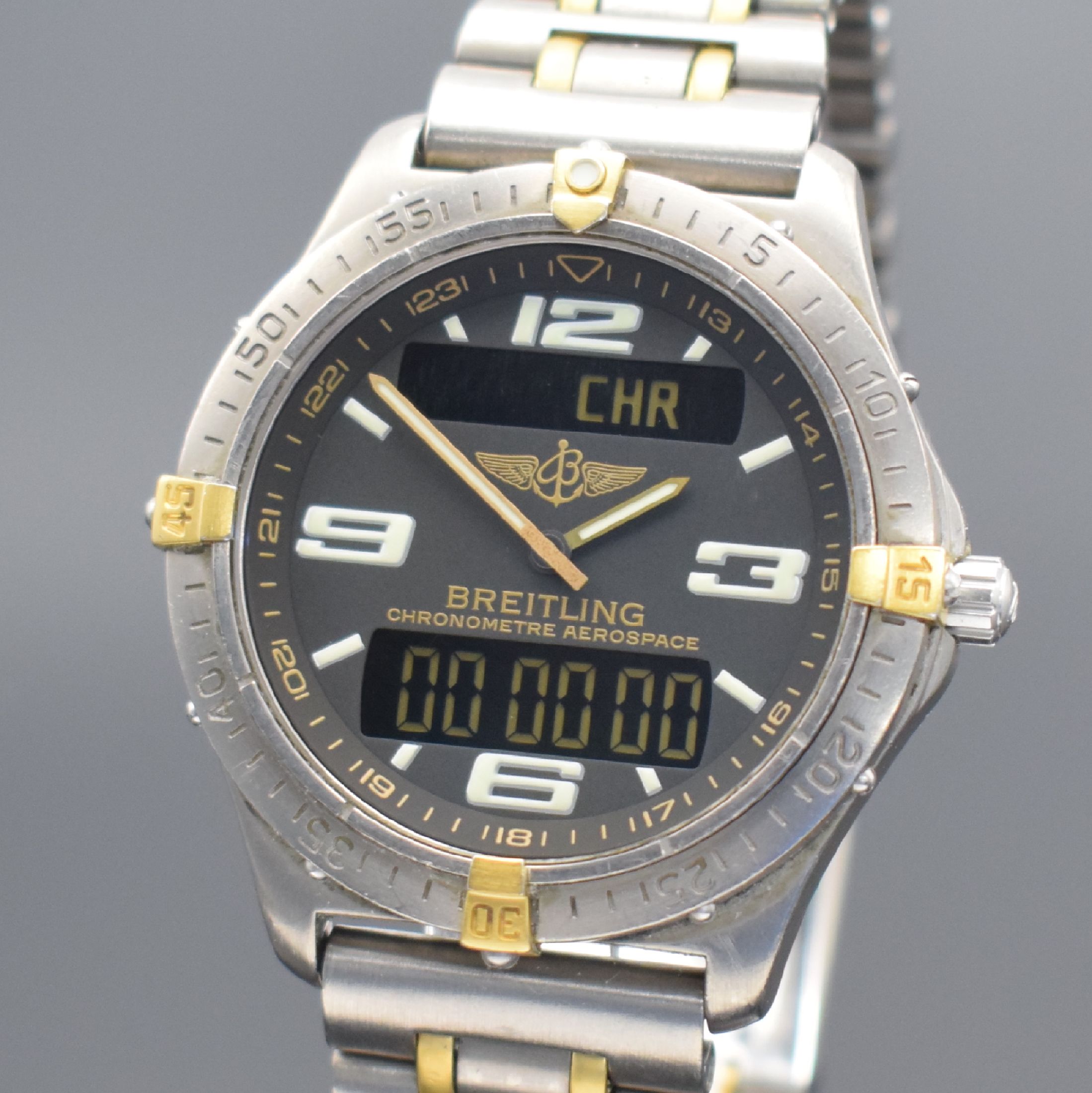 Detail b: BREITLING Aerospace Chronometer Multifunktionsuhr in Titan/Gold, Schweiz verk. lt. beil. Pap. 11/2002, quarz, Referenz F75362, Boden aufgedr., orig. ...