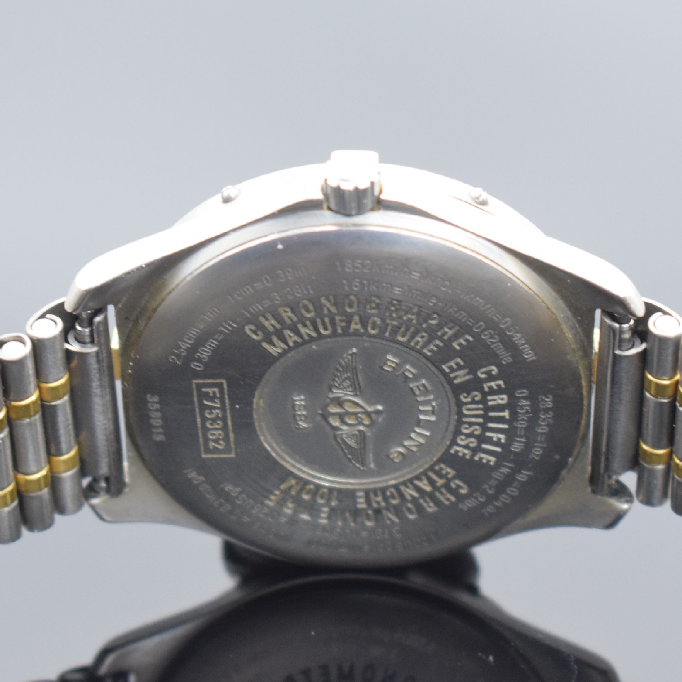 Detail f: BREITLING Aerospace Chronometer Multifunktionsuhr in Titan/Gold, Schweiz verk. lt. beil. Pap. 11/2002, quarz, Referenz F75362, Boden aufgedr., orig. ...