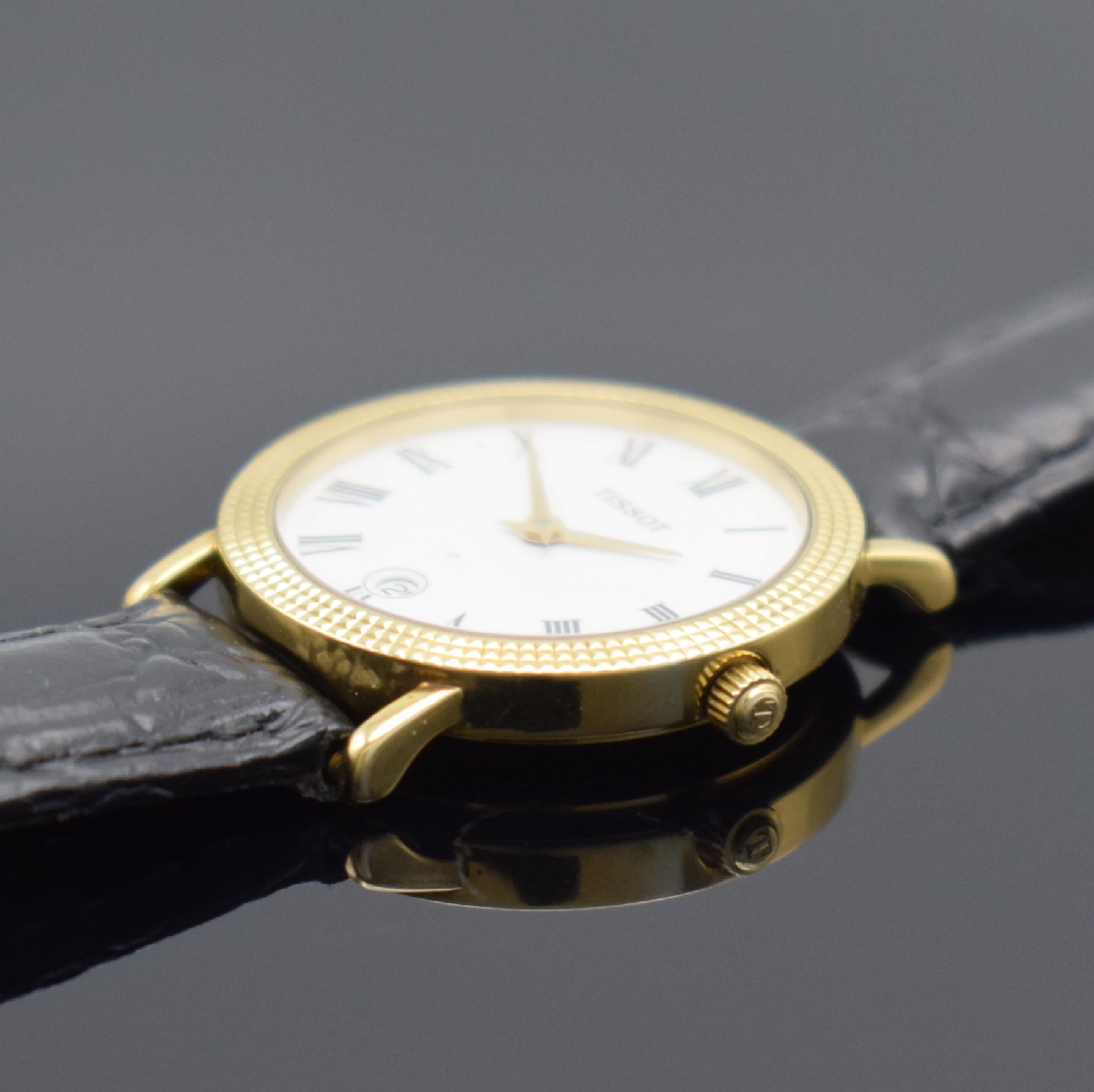 Detail b: TISSOT Damenarmbanduhr in GG 750/000, Schweiz um 1995, quarz, Boden aufgedr., Lünette m. Nagelmuster-Design, weißes Zifferbl. m. röm. Zahlen, ...