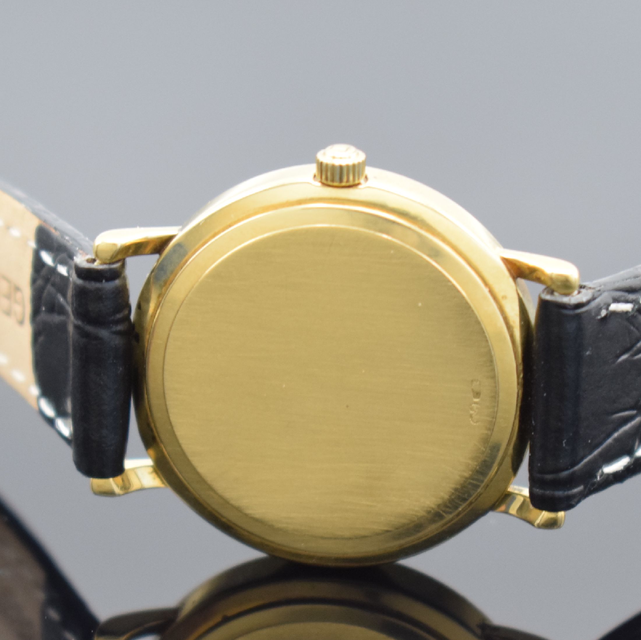 Detail c: TISSOT Damenarmbanduhr in GG 750/000, Schweiz um 1995, quarz, Boden aufgedr., Lünette m. Nagelmuster-Design, weißes Zifferbl. m. röm. Zahlen, ...