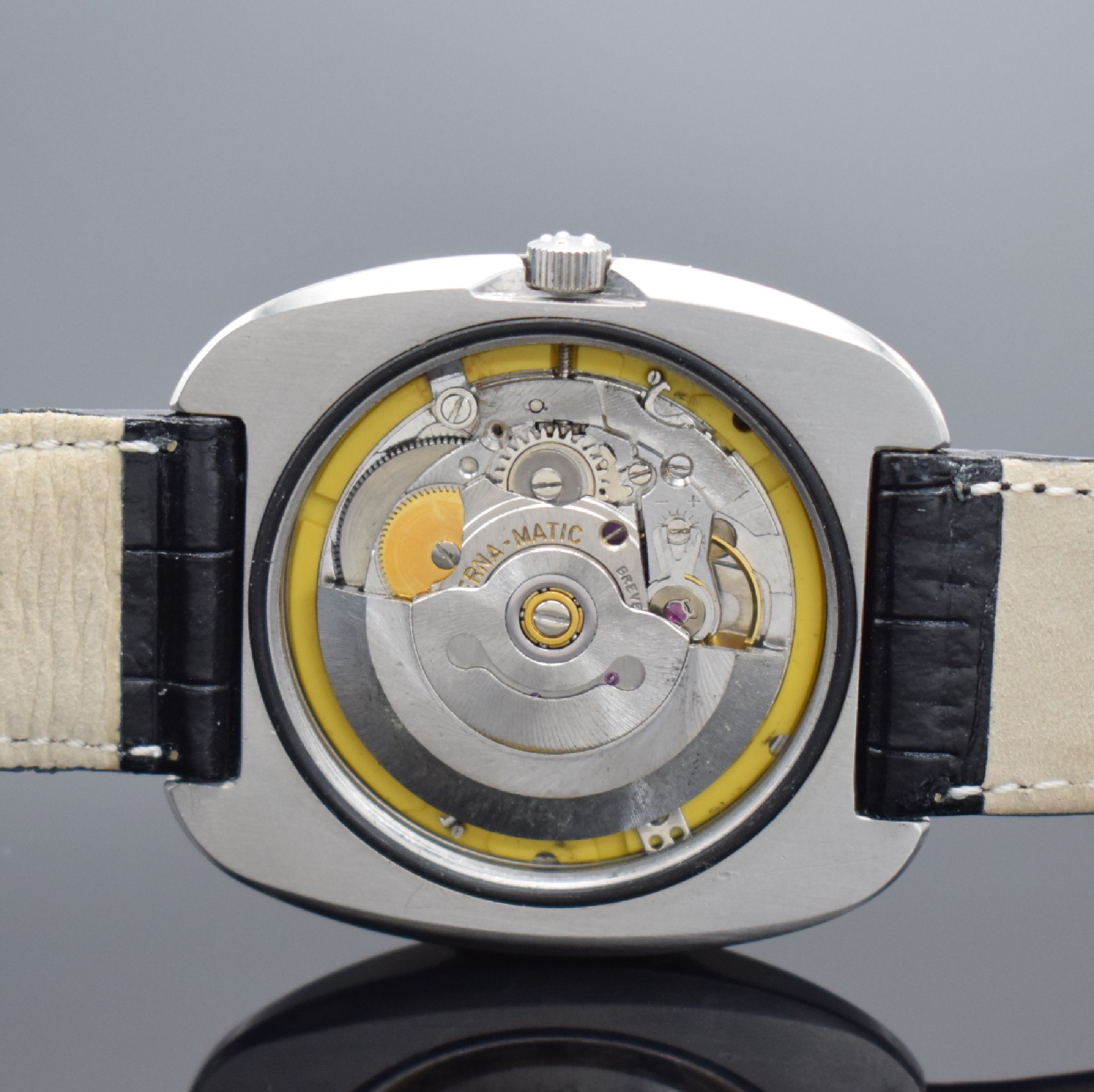 Detail d: ETERNA-MATIC 36000 Fast Beat Herrenarmbanduhr in Stahl, Schweiz um 1975, Automatik, matt. Edelstahlgeh., Boden verschr., silb. Zifferbl. m. ...