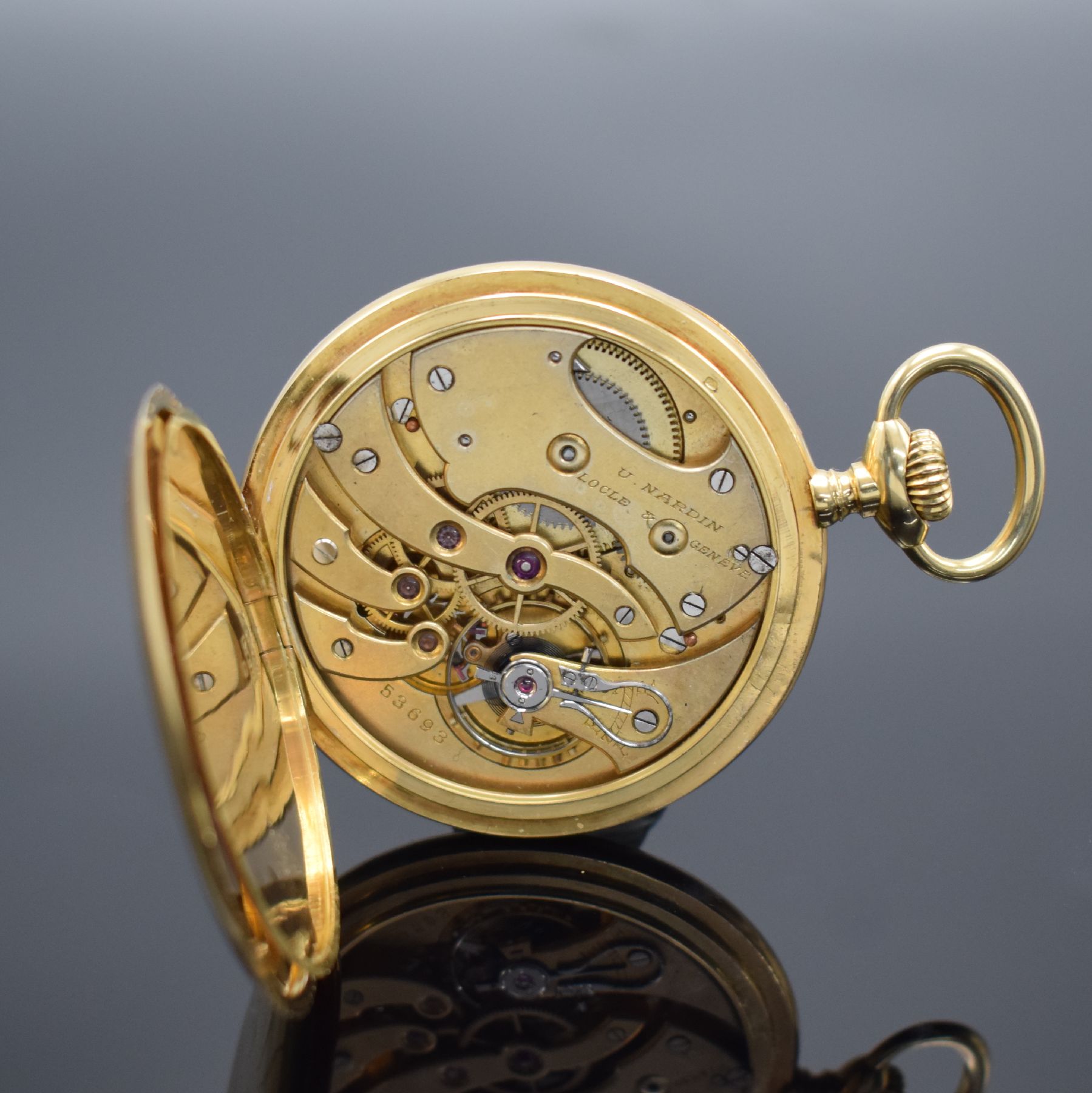 Detail e: ULYSSE NARDIN offene Herrentaschenuhr in GG 750/000, Schweiz um 1920, guill. 2-Deckel Goldgeh. dell., 2-tlg. Emailzifferbl. m. Breguetzahlen Rand l. ...