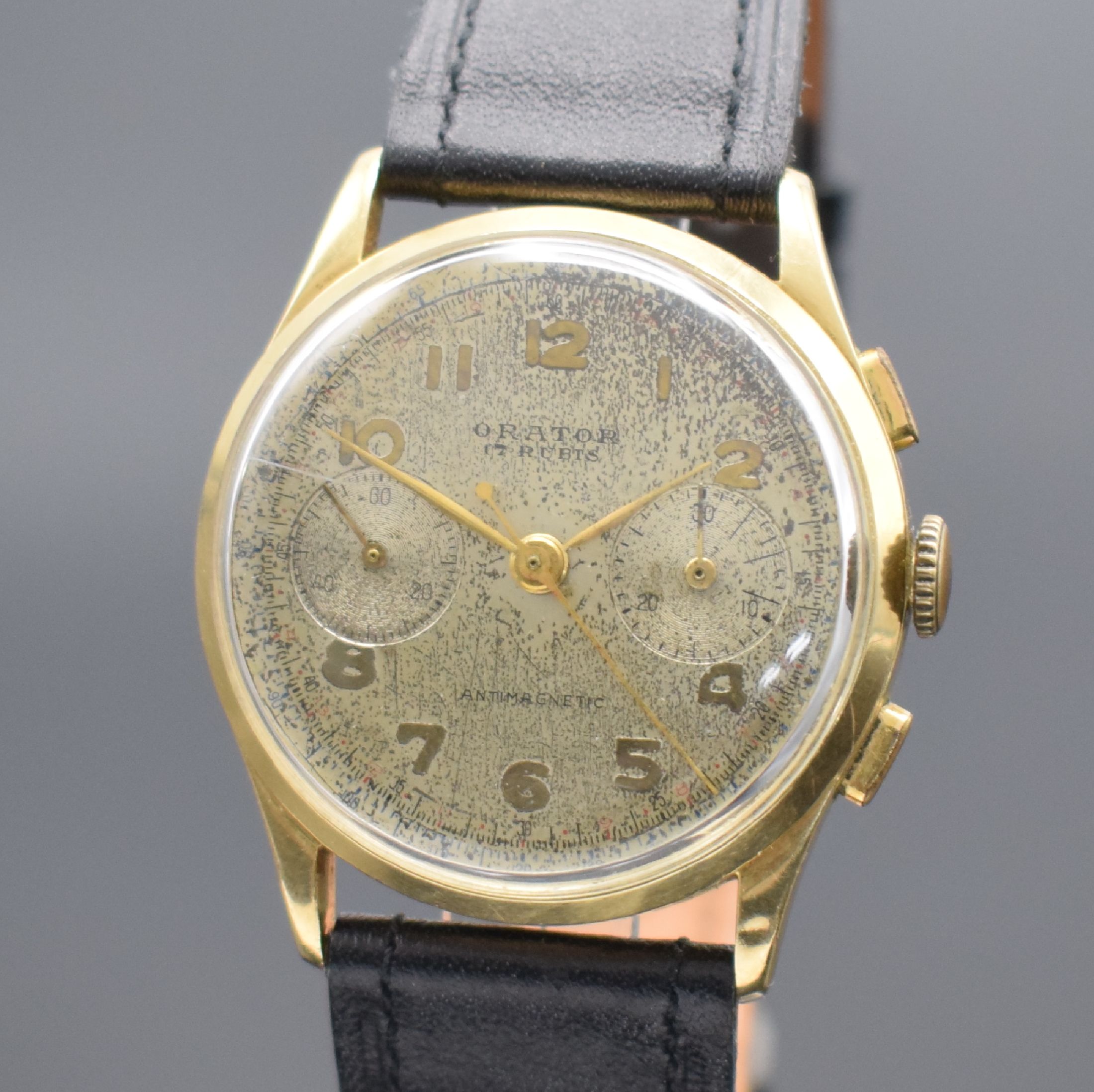 Detail a: ORATOR Herrenarmbanduhr mit Chronograph in GG 585/000, Schweiz um 1950, Handaufzug, Ref. 1660, massives Geh. & gedr. Boden dell., silb. Zifferbl. ...