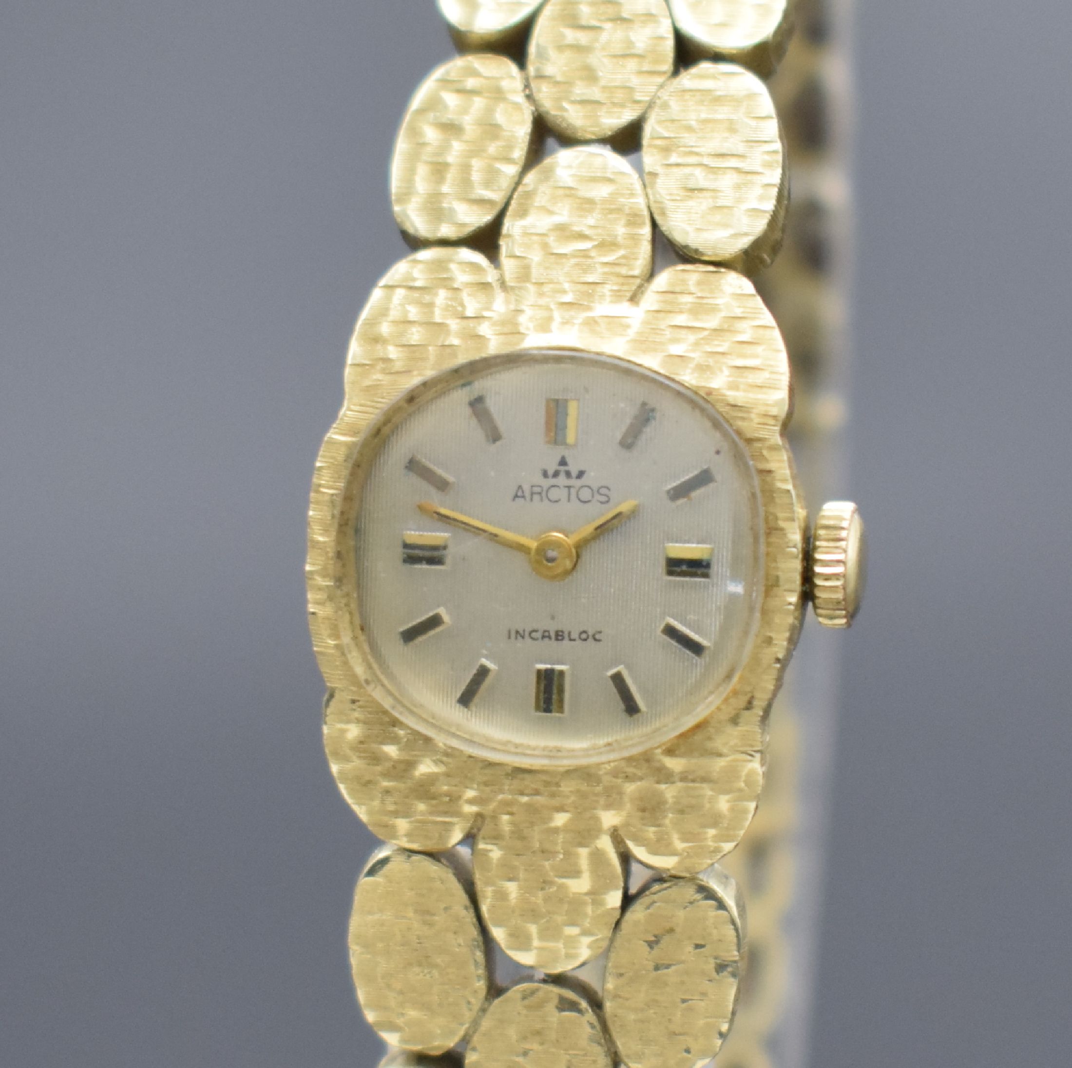 Detail a: ARCTOS ausgefallene Damenarmbanduhr in GG 585/000, Schweiz um 1970, Handaufzug, an GG 585/000 Armband, Boden aufgedr., silb. Strukturzifferbl. pat., ...