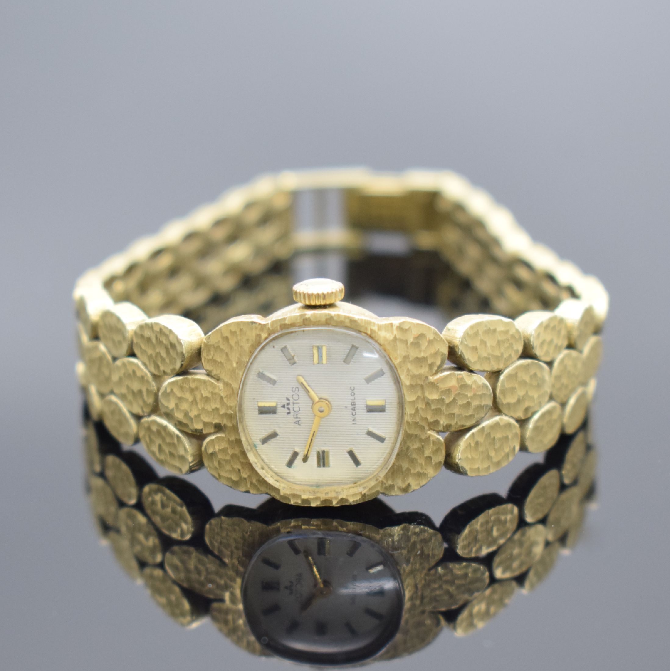Detail b: ARCTOS ausgefallene Damenarmbanduhr in GG 585/000, Schweiz um 1970, Handaufzug, an GG 585/000 Armband, Boden aufgedr., silb. Strukturzifferbl. pat., ...