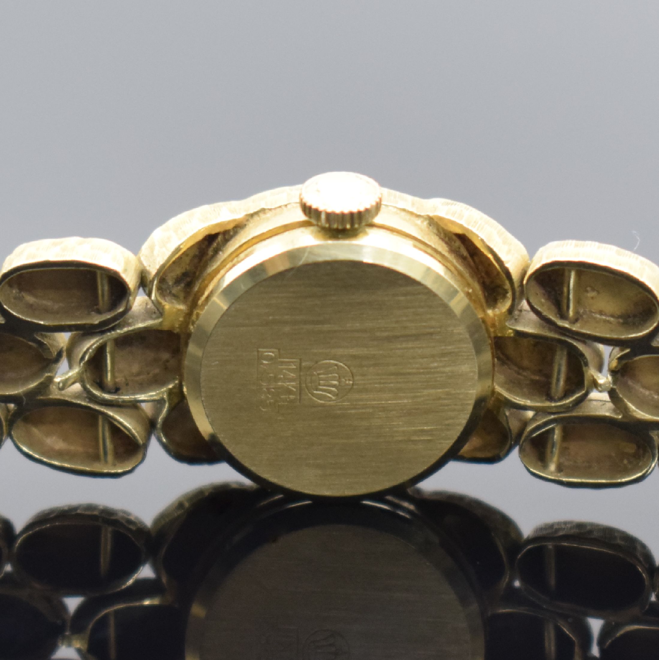 Detail d: ARCTOS ausgefallene Damenarmbanduhr in GG 585/000, Schweiz um 1970, Handaufzug, an GG 585/000 Armband, Boden aufgedr., silb. Strukturzifferbl. pat., ...