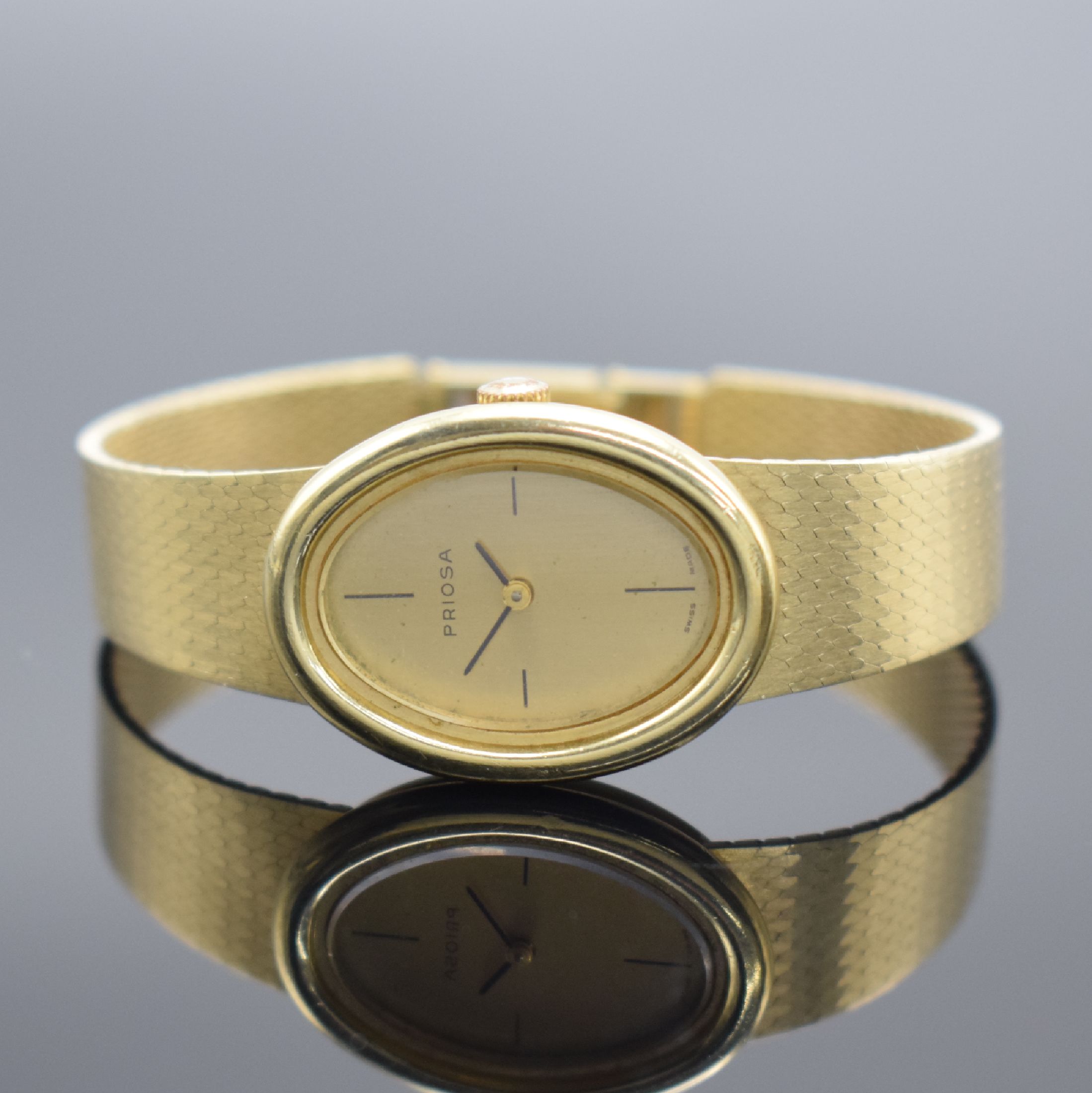 Detail b: PRIOSA Damenarmbanduhr in GG 585/000, Handaufzug, Schweiz um 1970, 2-teil. Geh. an Milanaiseband, Boden aufgedr., gold. Zifferbl. altersbed. fl., ...