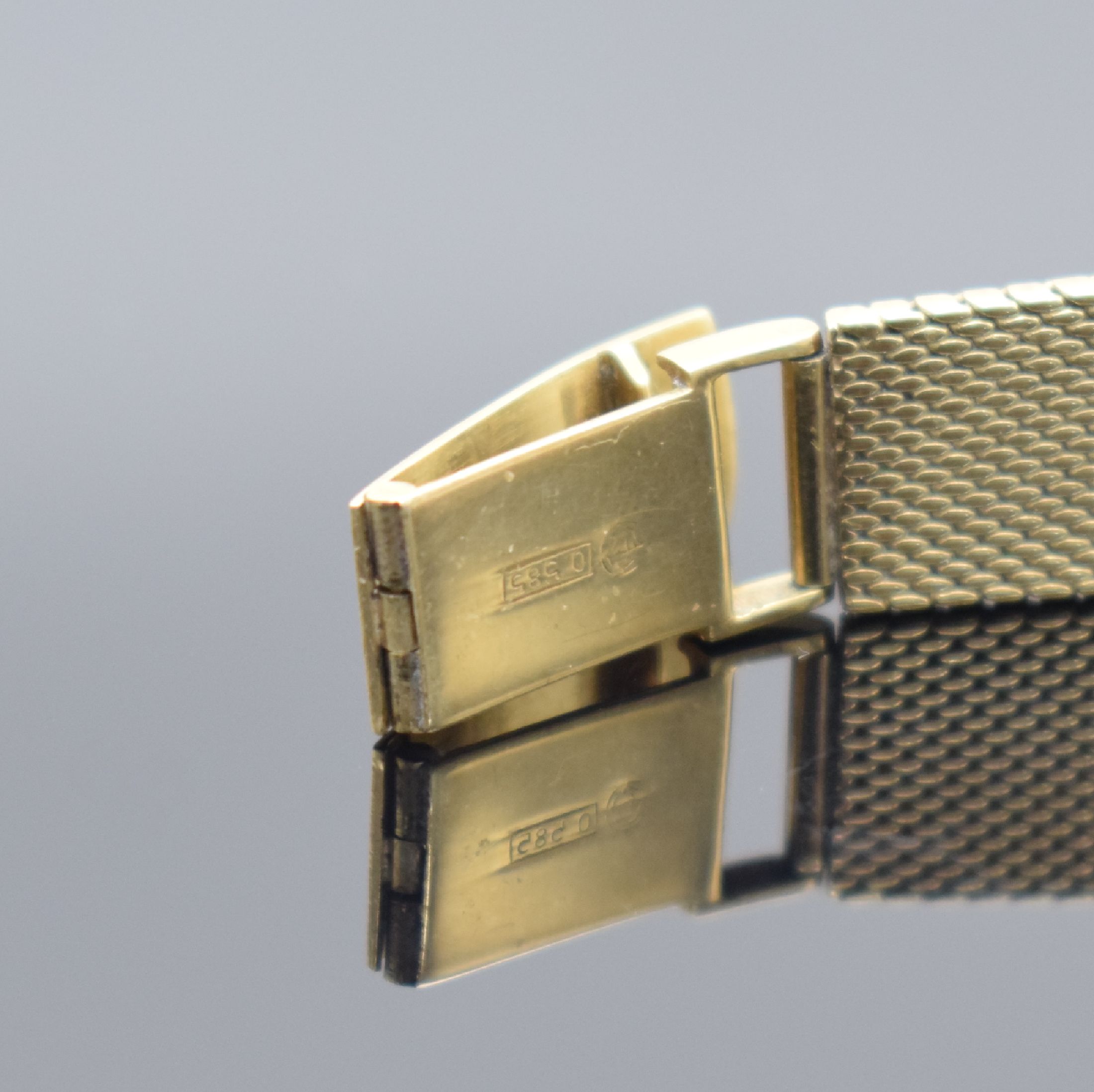 Detail c: MERIT Damenarmbanduhr in GG 585/000, Schweiz 1960er Jahre, Handaufzug, Boden aufgedr., an Goldband GG 585/000 Armband, silb. Zifferbl. m. gold. ...