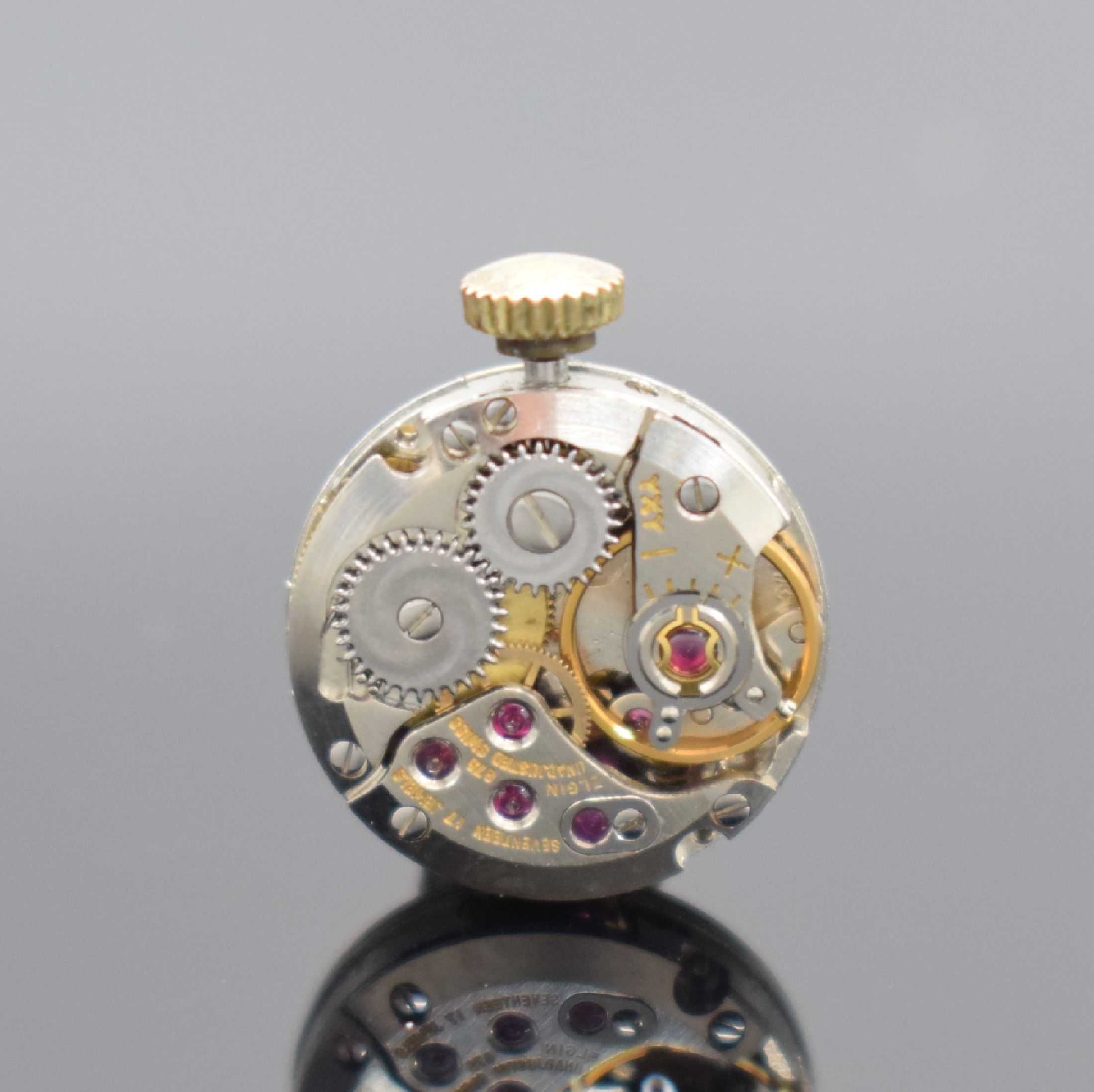 Detail e: MERIT Damenarmbanduhr in GG 585/000, Schweiz 1960er Jahre, Handaufzug, Boden aufgedr., an Goldband GG 585/000 Armband, silb. Zifferbl. m. gold. ...