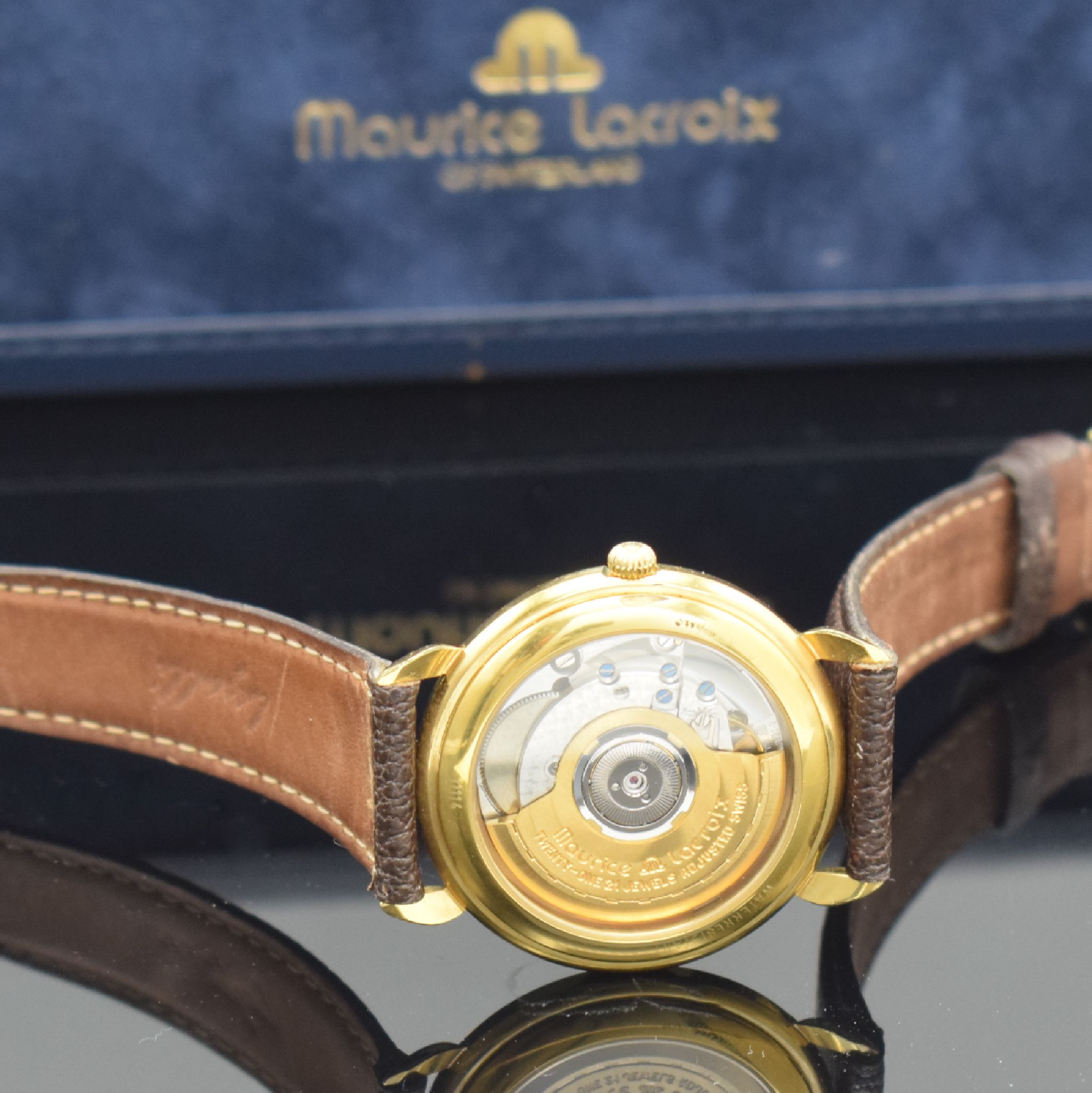 Detail d: MAURICE LACROIX Herrenarmbanduhr, Automatik, verg., beids. vergl. Gehäuse, Boden gedr., gold. Zifferbl. m. aufges. Std.-Ind., gold. Zeiger, Datum, ...